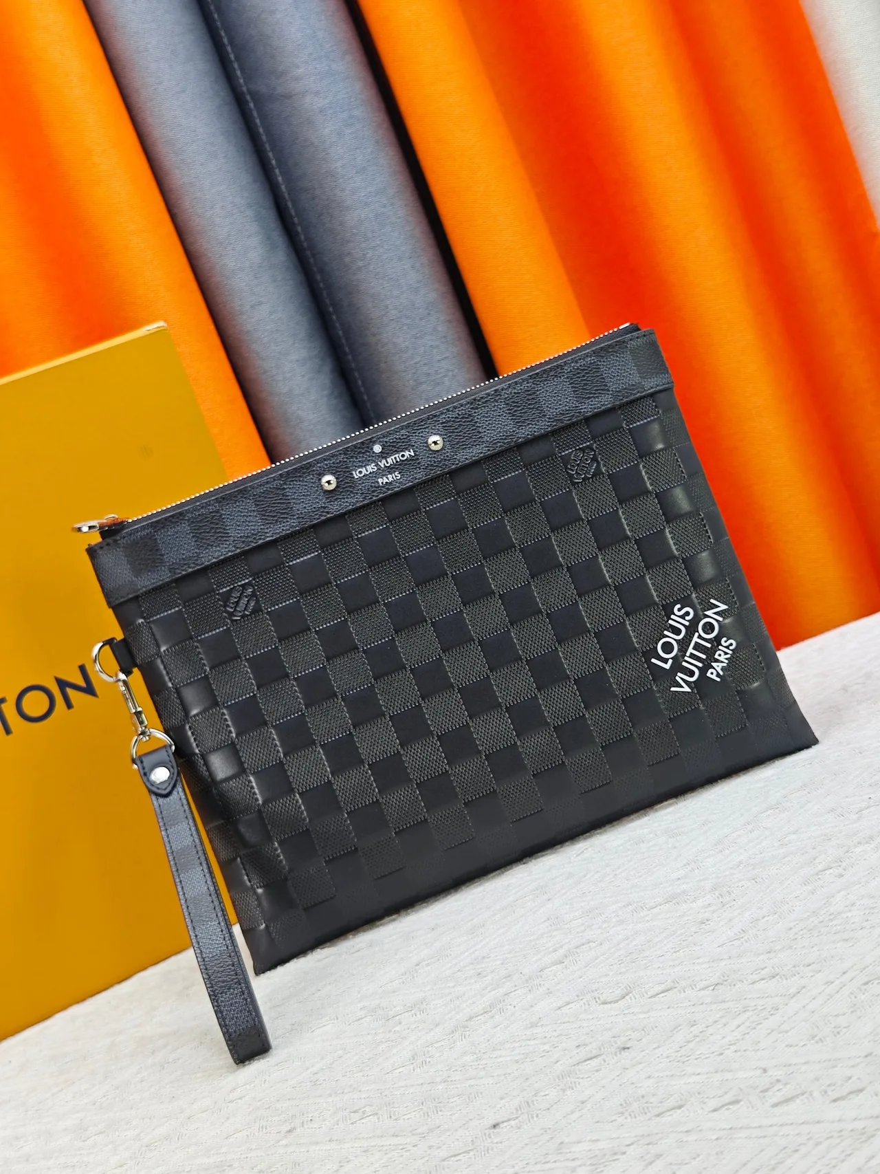 Louis Vuitton Canvas Woven Wristlet Pouch in Black · view 1