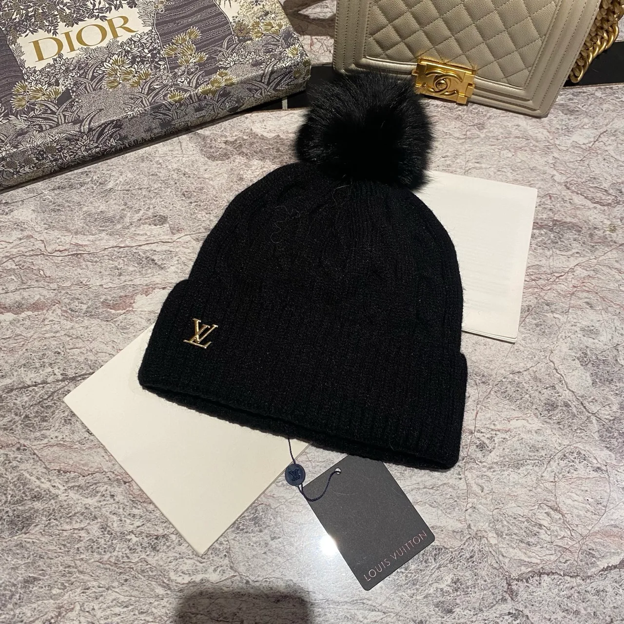 Louis Vuitton Cable knit pom beanie in Black & White & Blue & Burgundy & Cream & Grey & Brown & Pink · view 1