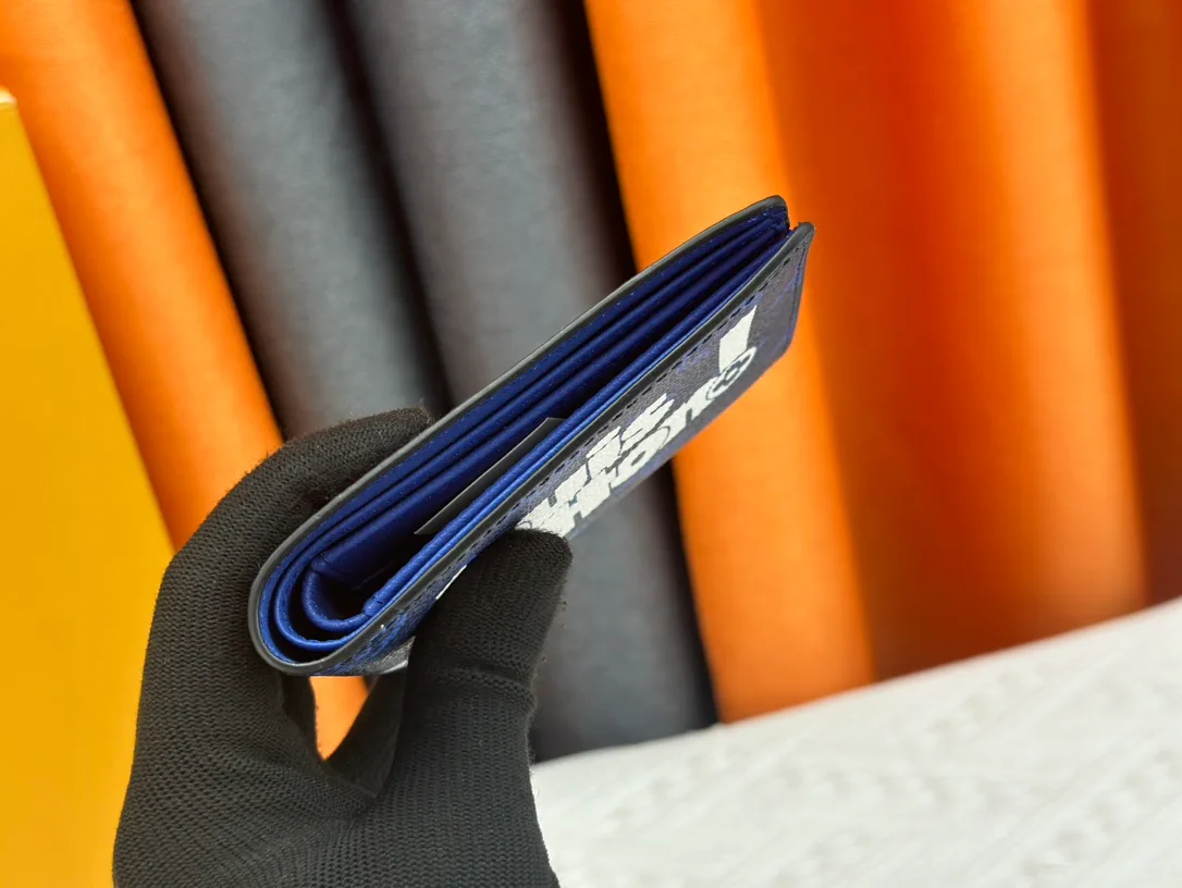 Louis Vuitton Canvas Monogram Wallet in Blue · view 6
