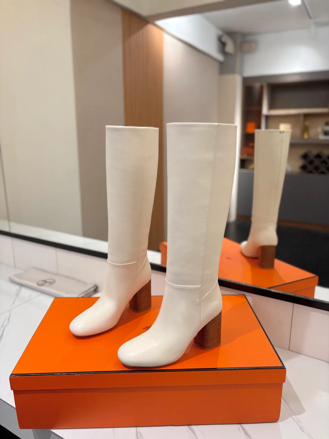 Hermes Cowhide Matte Round-Toe Knee-High Boots in White · view 2