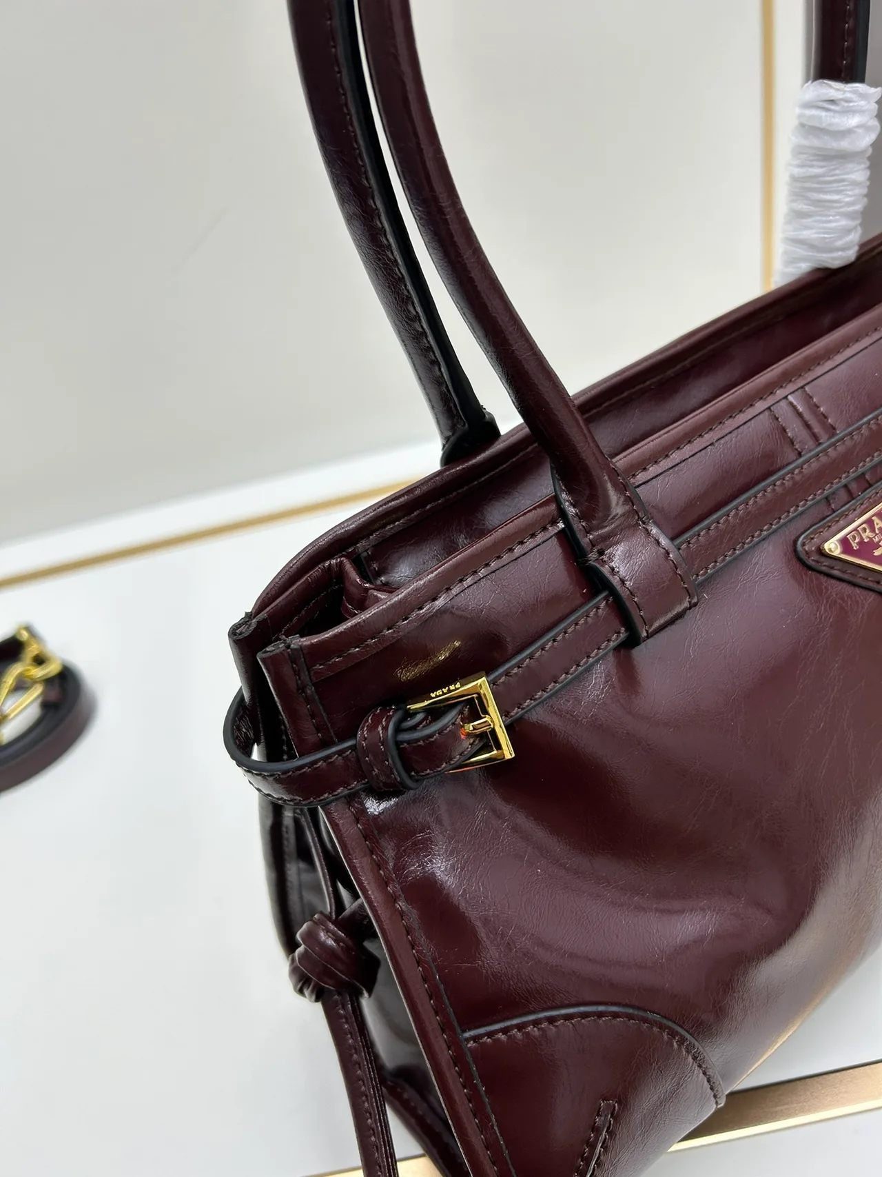 Prada Glossy Top-Handle Bag in Burgundy · view 6