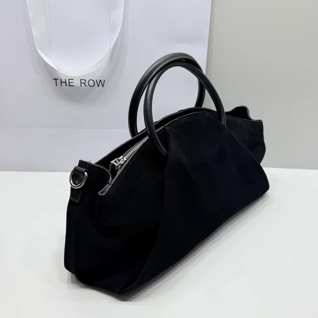 The Row Top-Handle Bag in Black · view 7