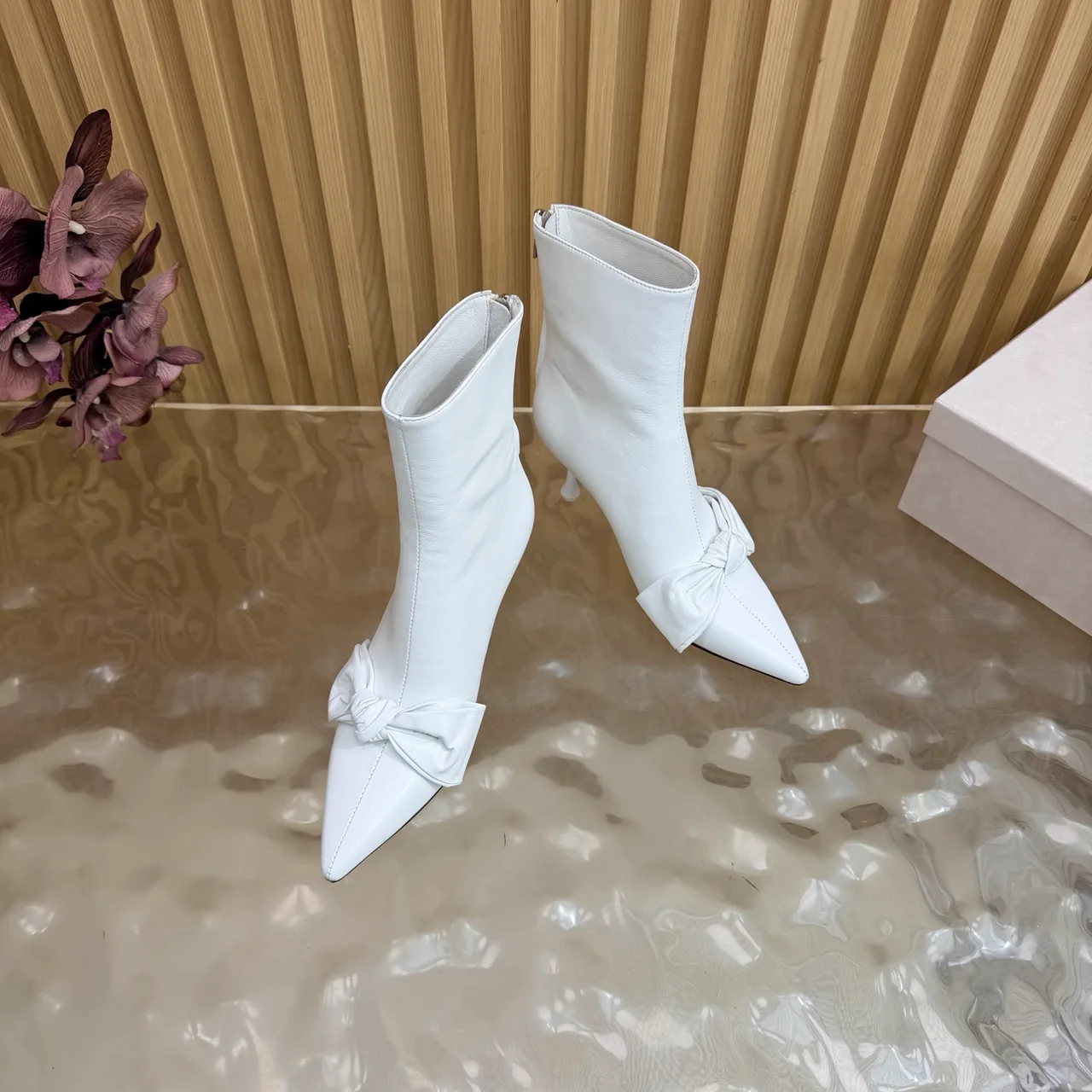 Jimmy Choo Cowhide Glossy Pointed-Toe Bow Ankle Boots in White · view 6