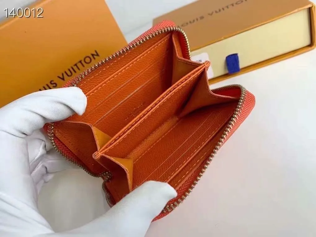 Louis Vuitton Zip Coin Wallet in Orange · view 7