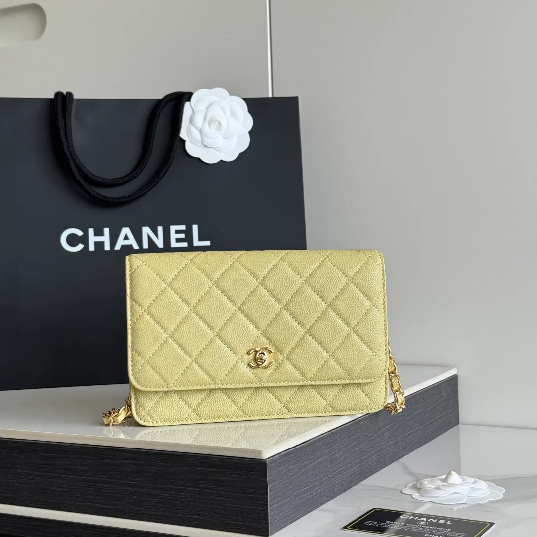Chanel Calfskin Quilted Clutch in Yellow · view 1