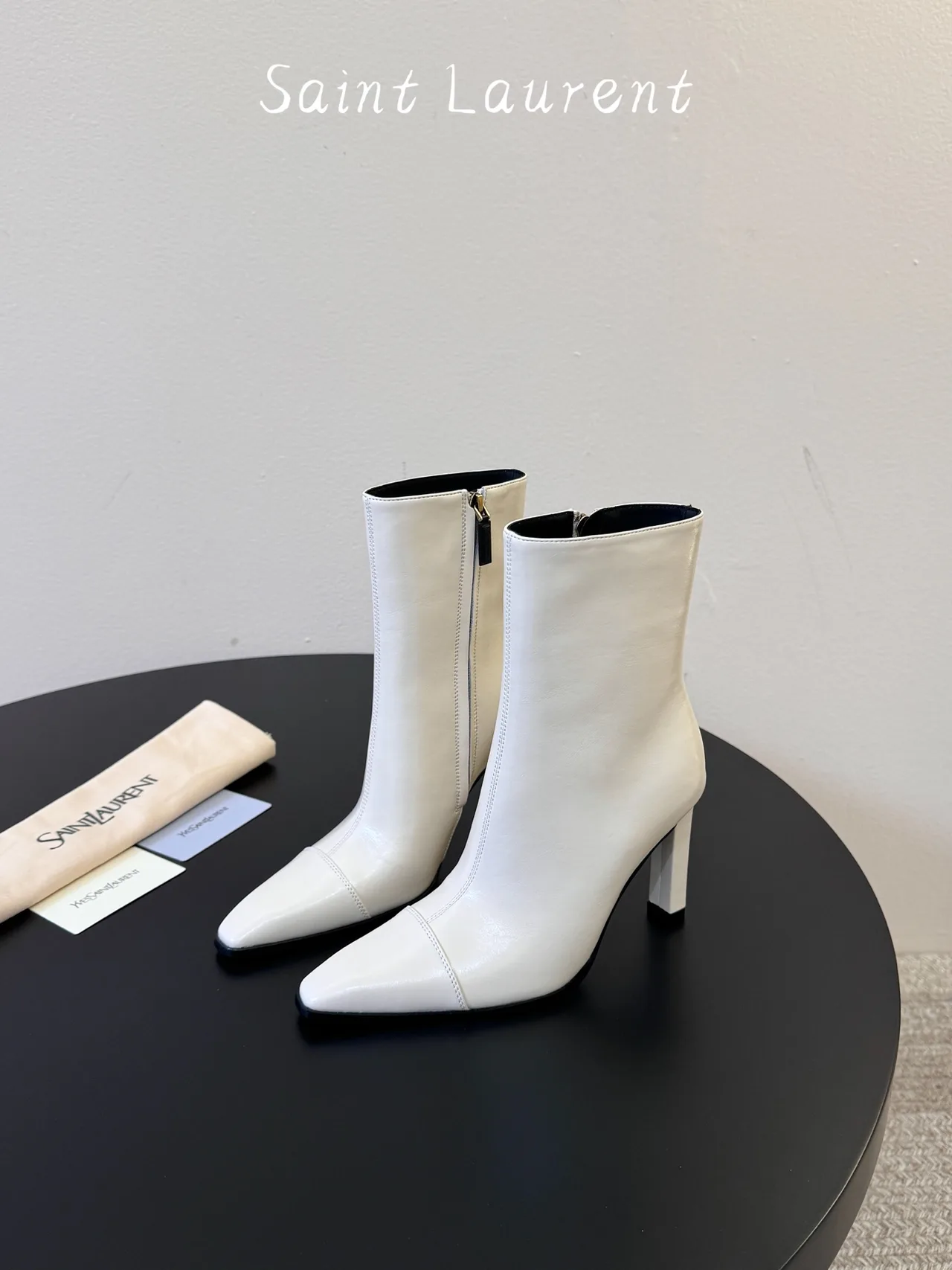 Saint Laurent Glossy Pointed-Toe Ankle Boots in White · view 5
