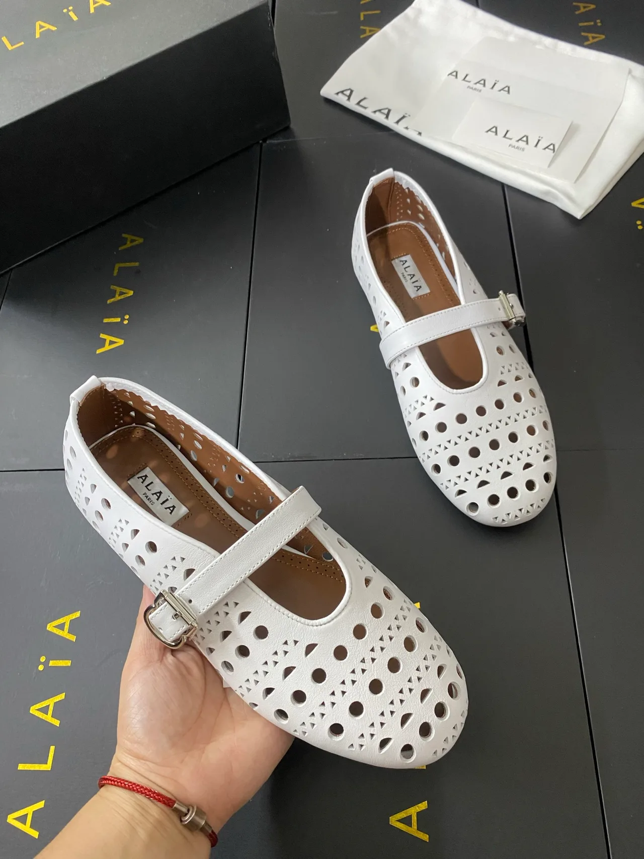Alaia Cowhide Sheepskin Round-Toe Buckle Ballet Flats in White · view 7