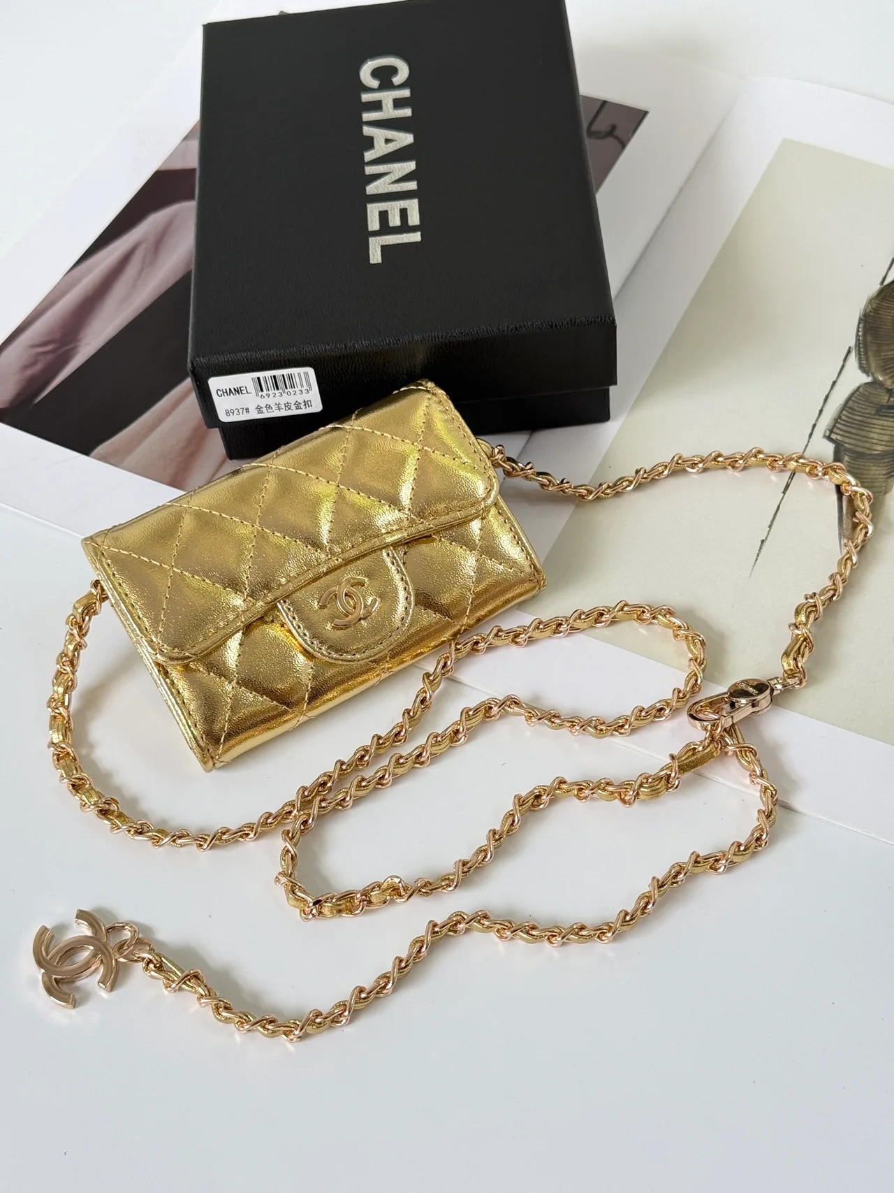 Chanel Quilted Glossy Wallet in Gold · view 1