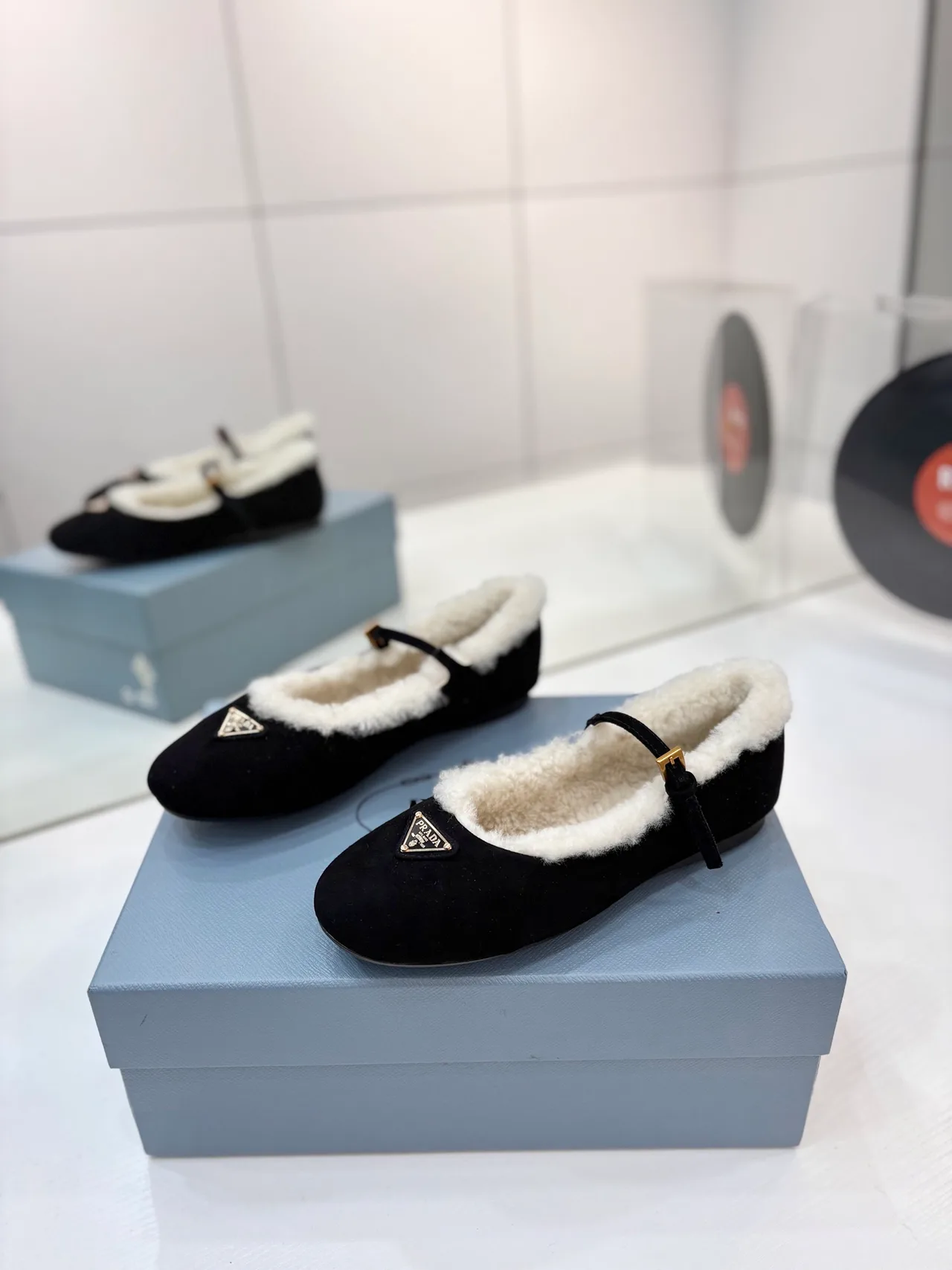 Prada Buckle Fur-Lined Mary Jane Flats in Black · view 2