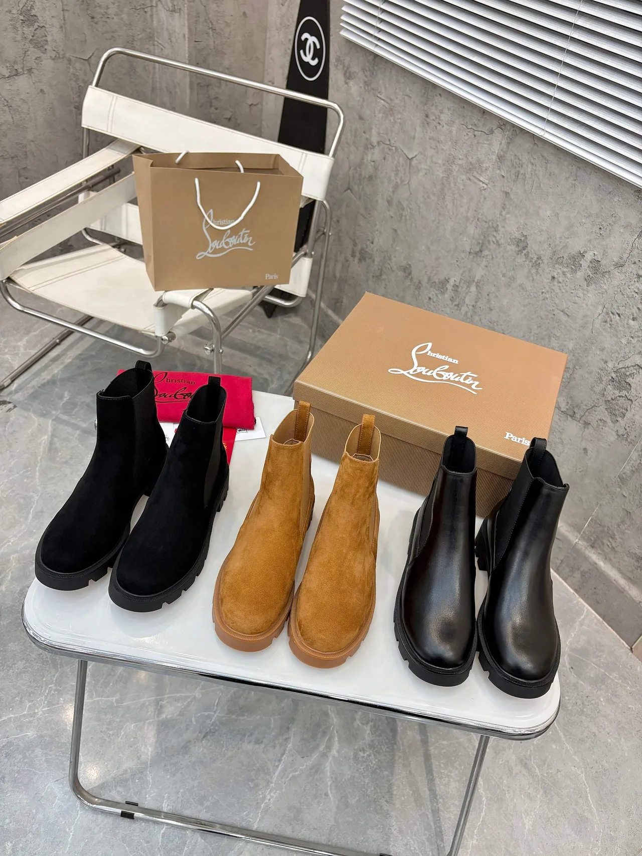 Christian Louboutin Chelsea ankle boots in Black & Brown · view 1