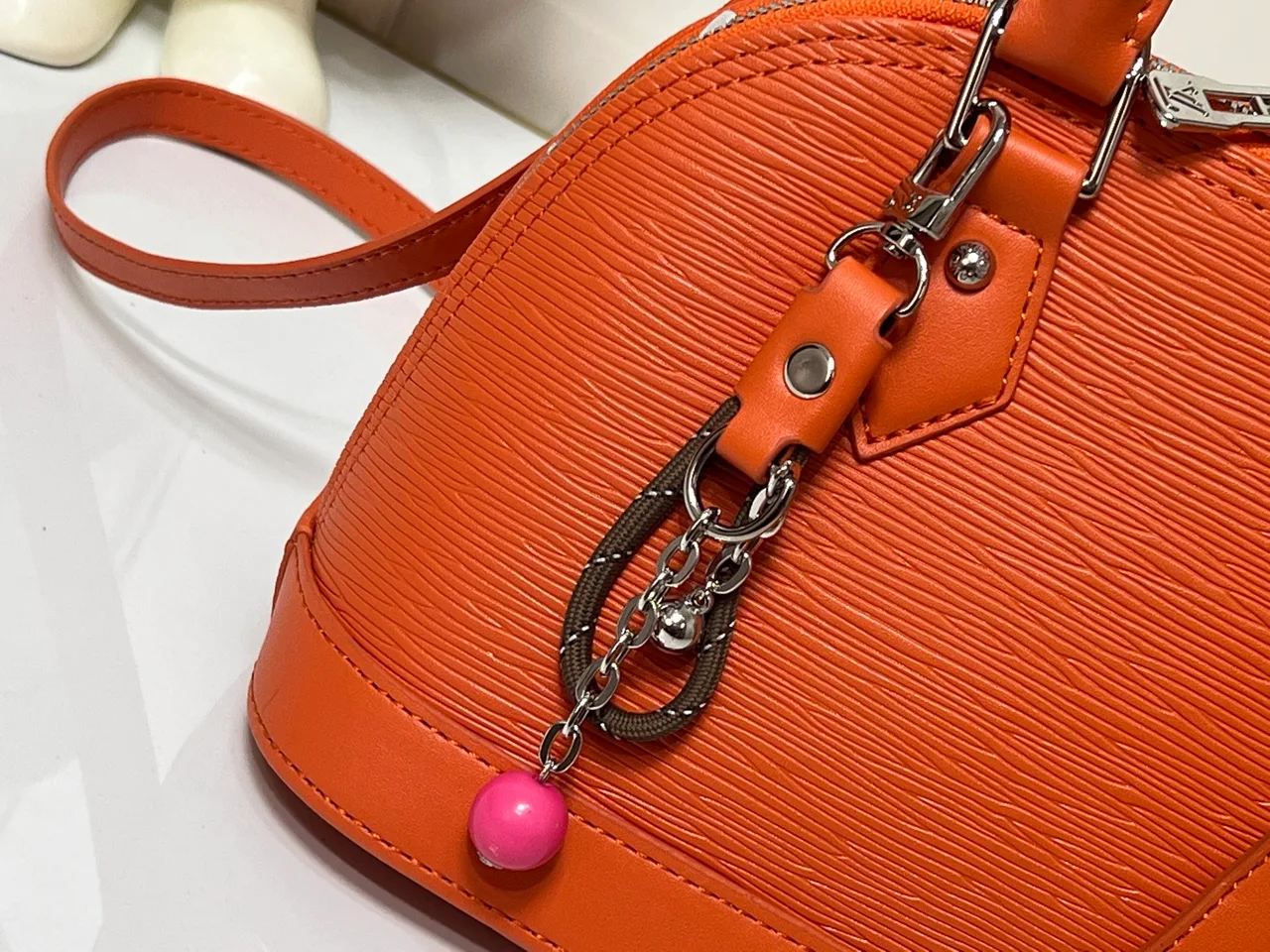 Louis Vuitton Leather Handbag in Orange · view 6