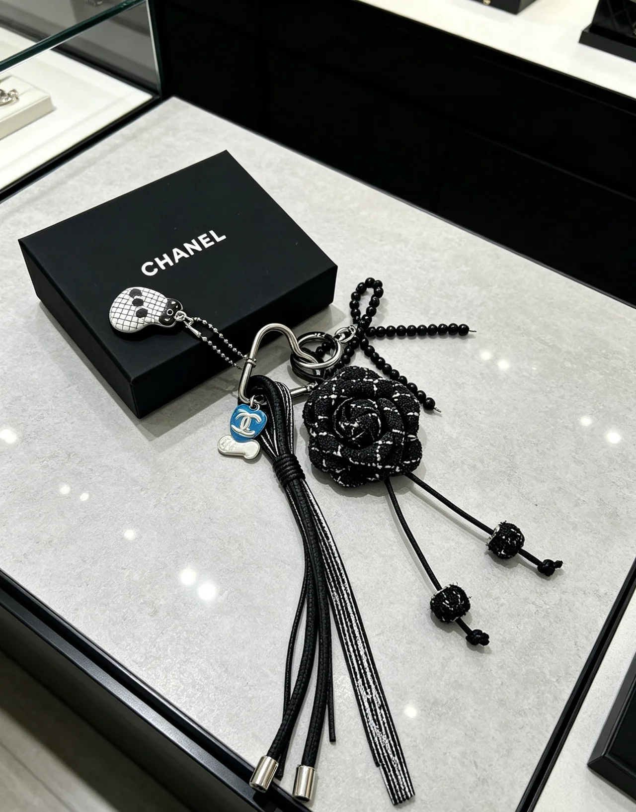 Chanel Woven Floral Tassel Keychain in Black · view 5