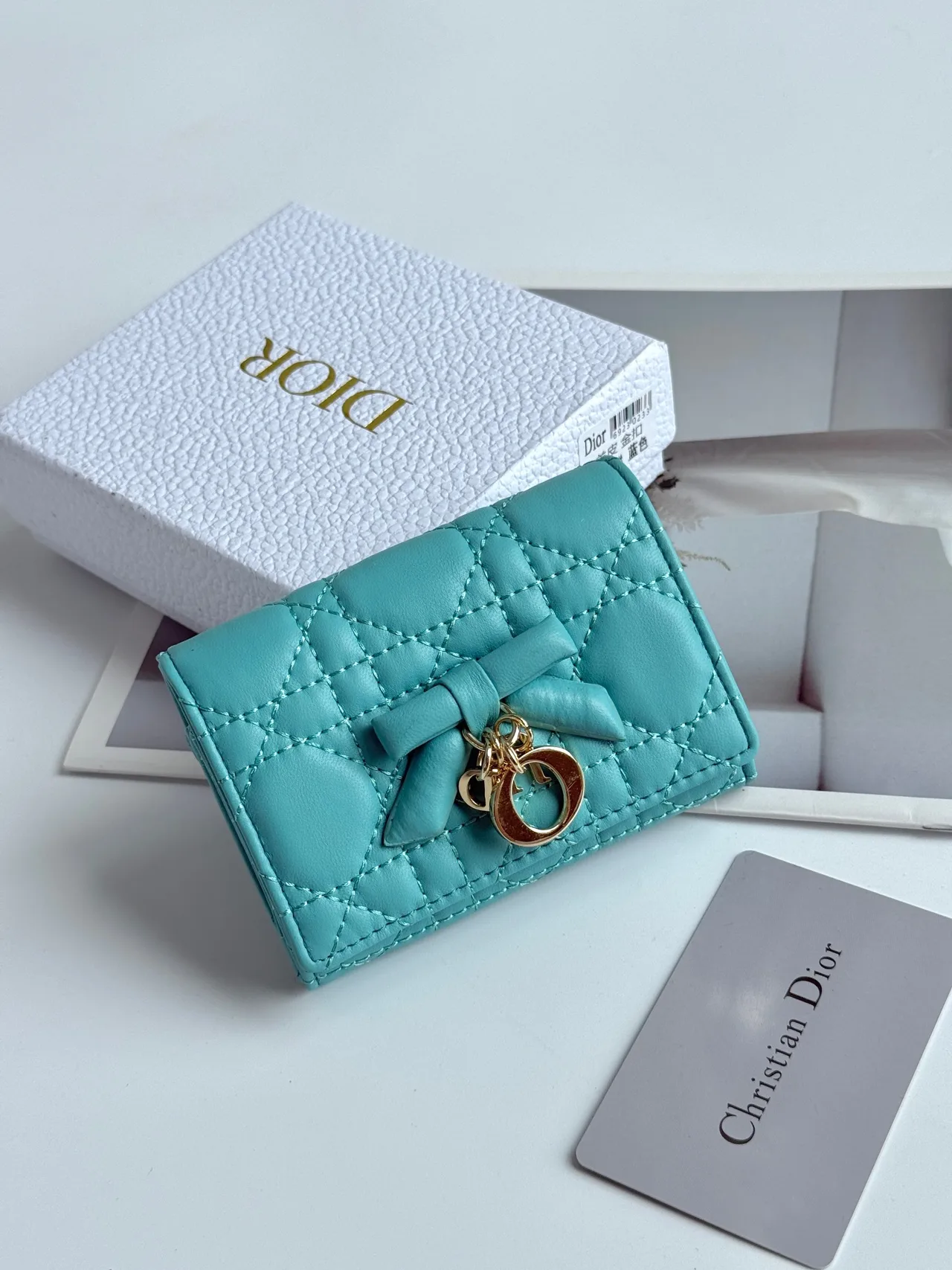 Dior Calfskin Quilted Bow Coin Cardholder in Blue · view 1