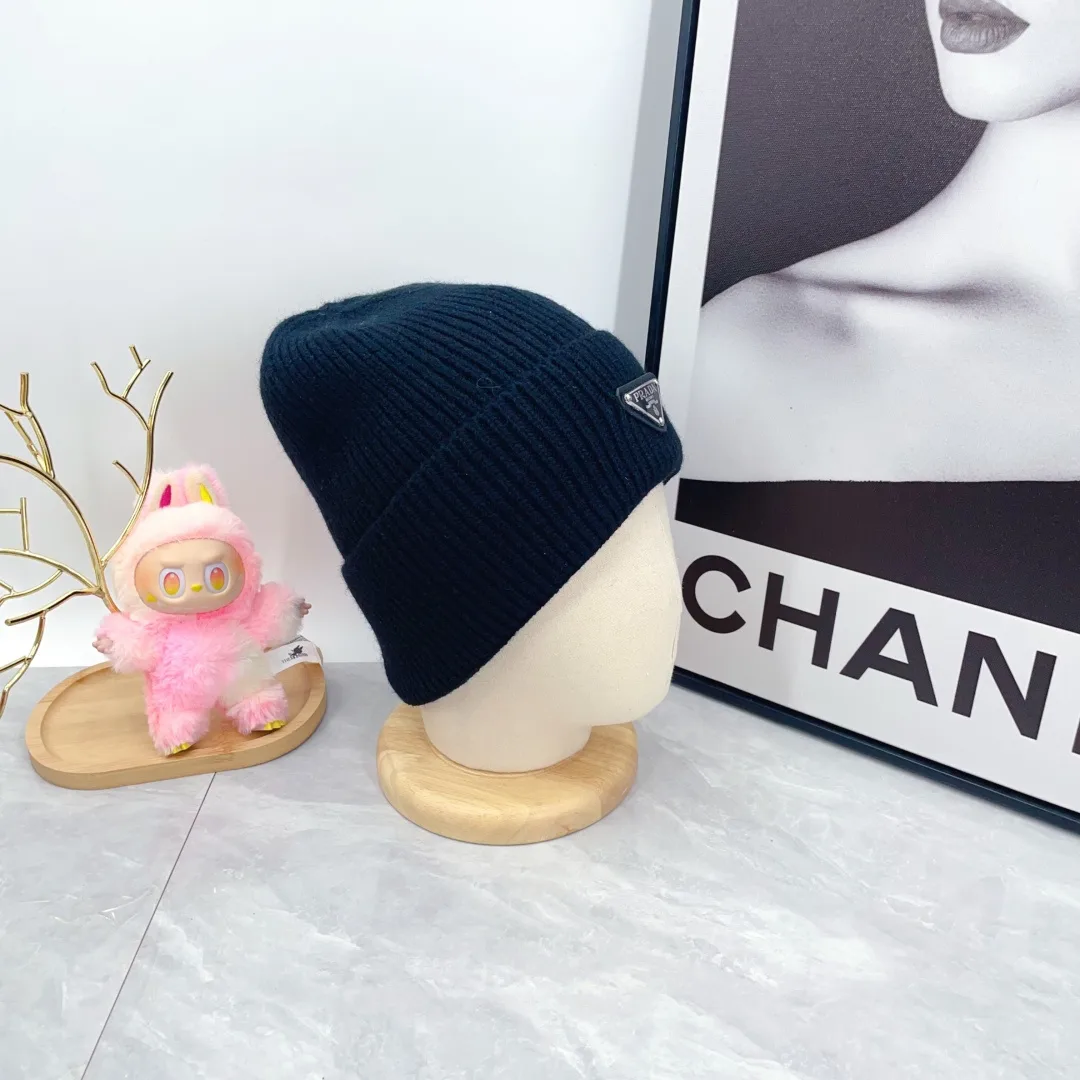Prada Triangle-Badge Beanie in Black & Grey & White & Beige & Brown & Yellow & Blue & Pink & Red · view 6