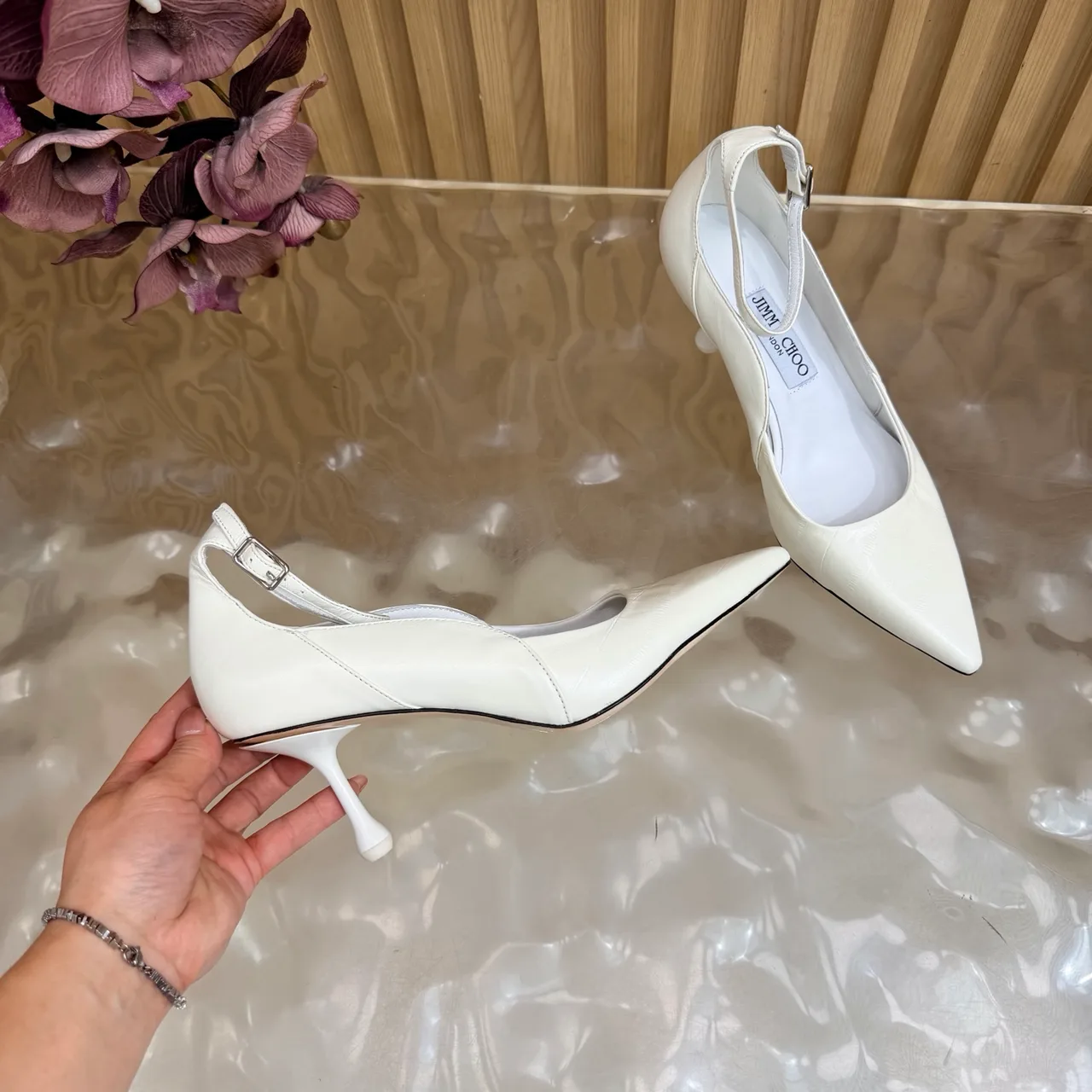 Jimmy Choo Cowhide Glossy Pointed-Toe Pointed Heel Pumps in White · view 7