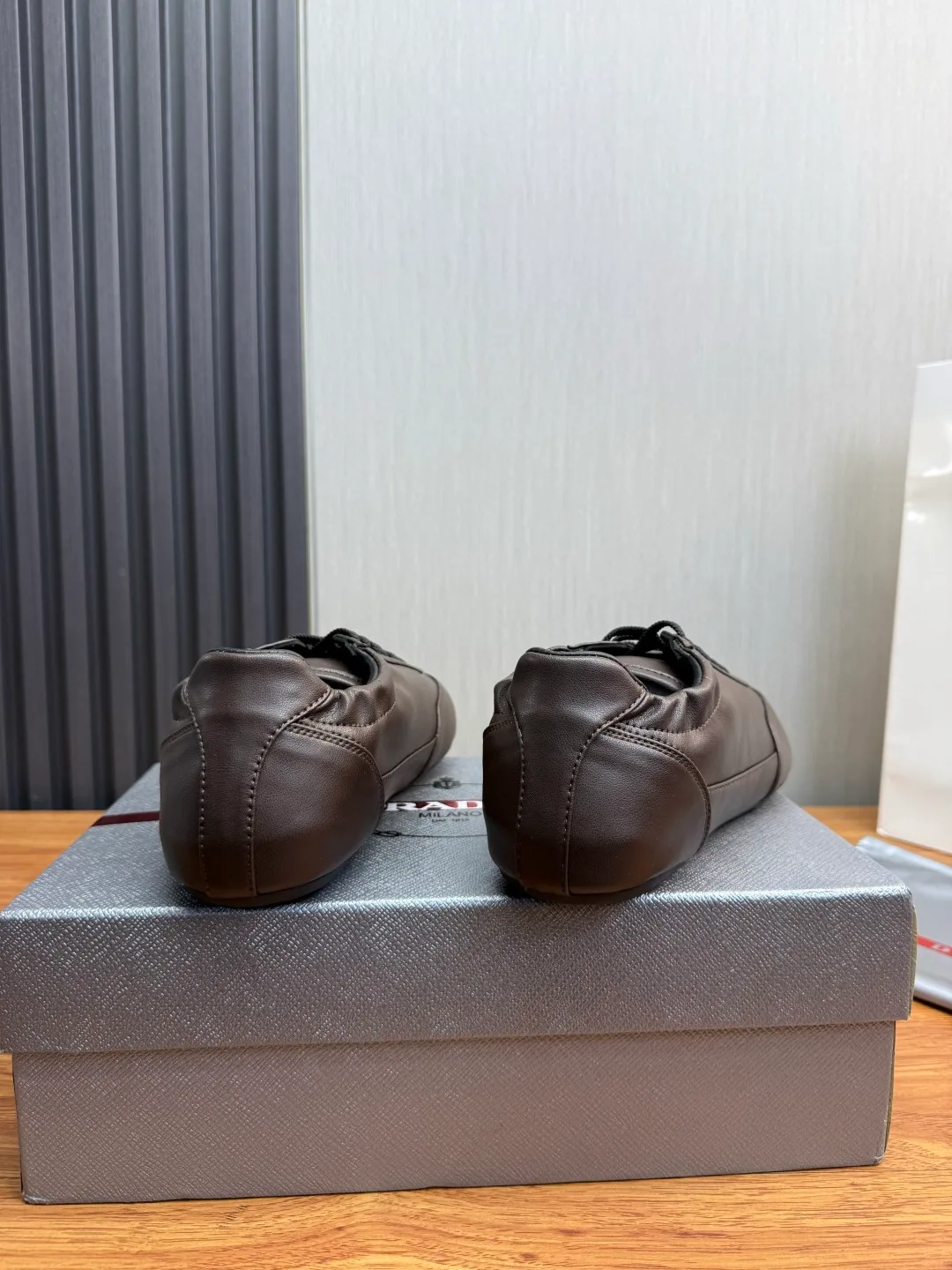 Prada Cowhide Quilted Round-Toe Sneakers in Brown · view 5