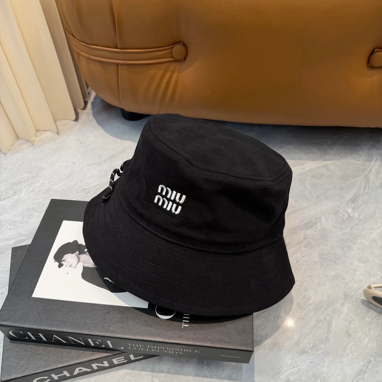 Miu Miu Embroidered Bucket Hat in Black · view 4