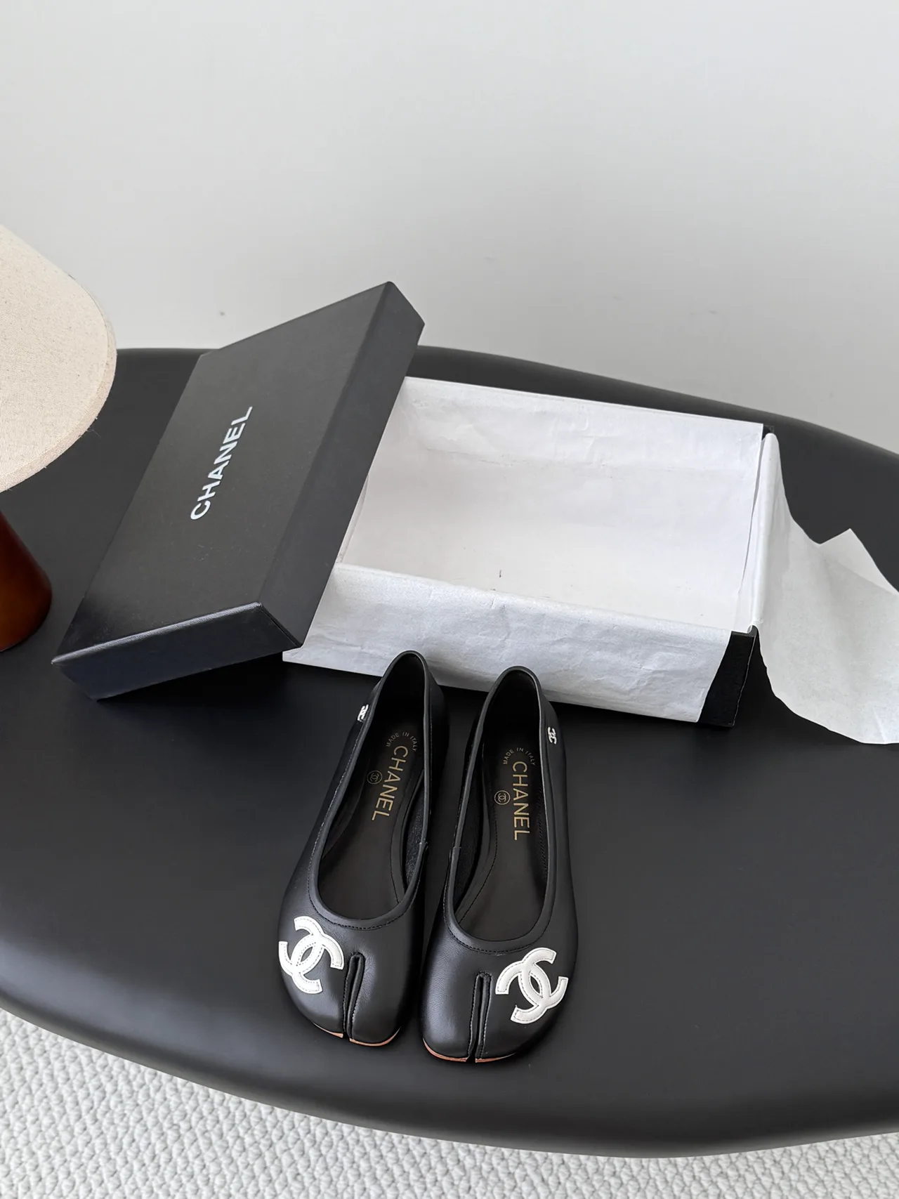 Chanel Cowhide Ballet Flats in Black · view 1
