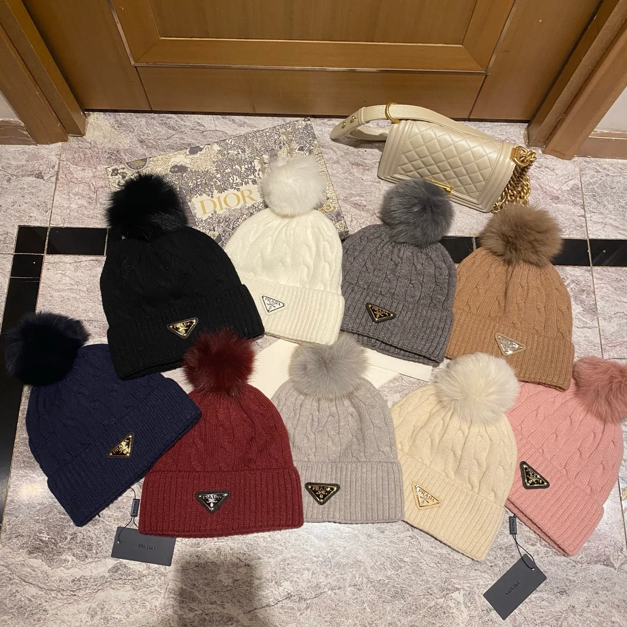 Prada Cable knit pom beanie in Black & White & Grey & Brown & Cream & Blue & Burgundy & Pink · view 8