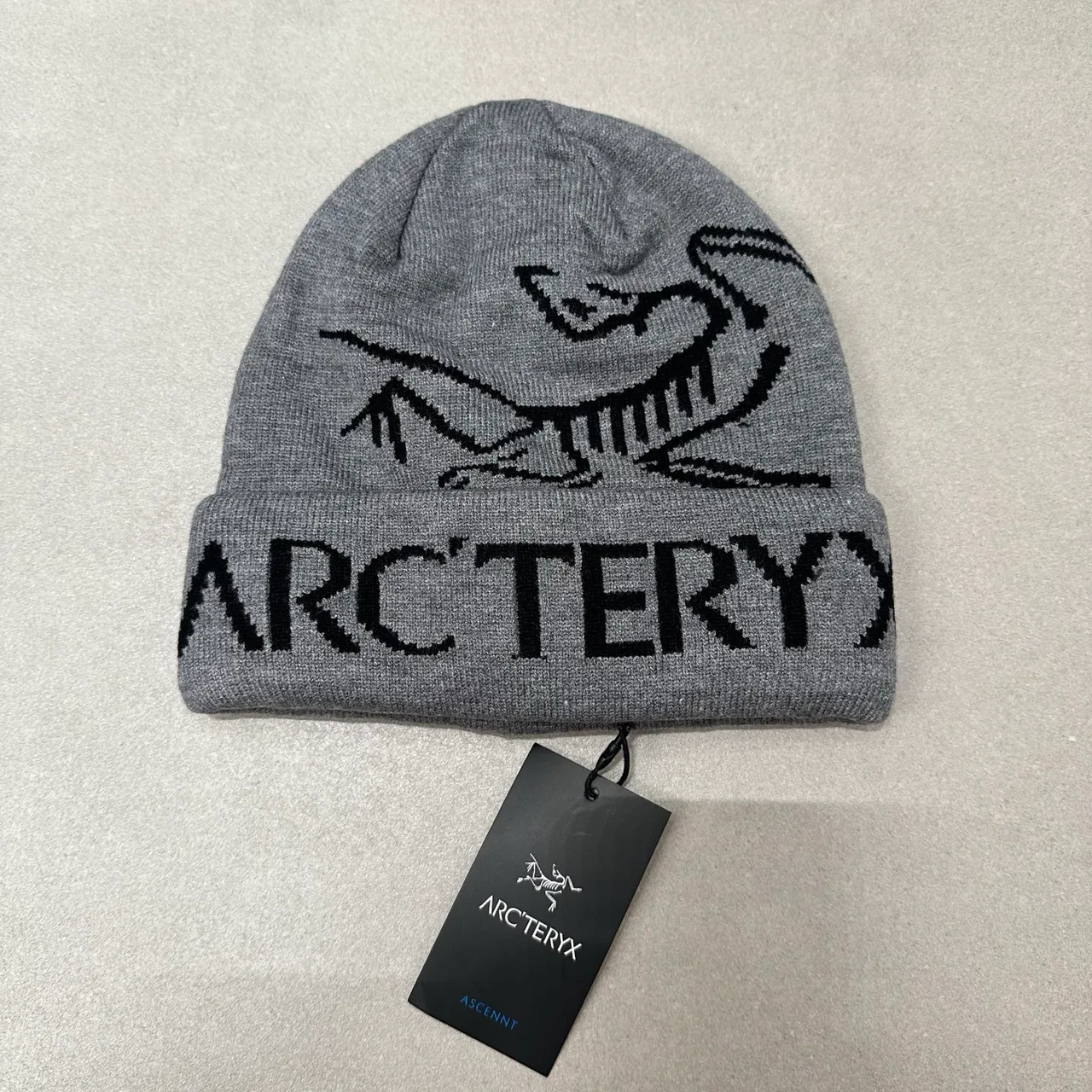 Arc'teryx Graphic knit beanie in Cream & Grey & Burgundy & Orange & Green & Pink & Yellow & Black & Blue & Beige & Tan · view 2