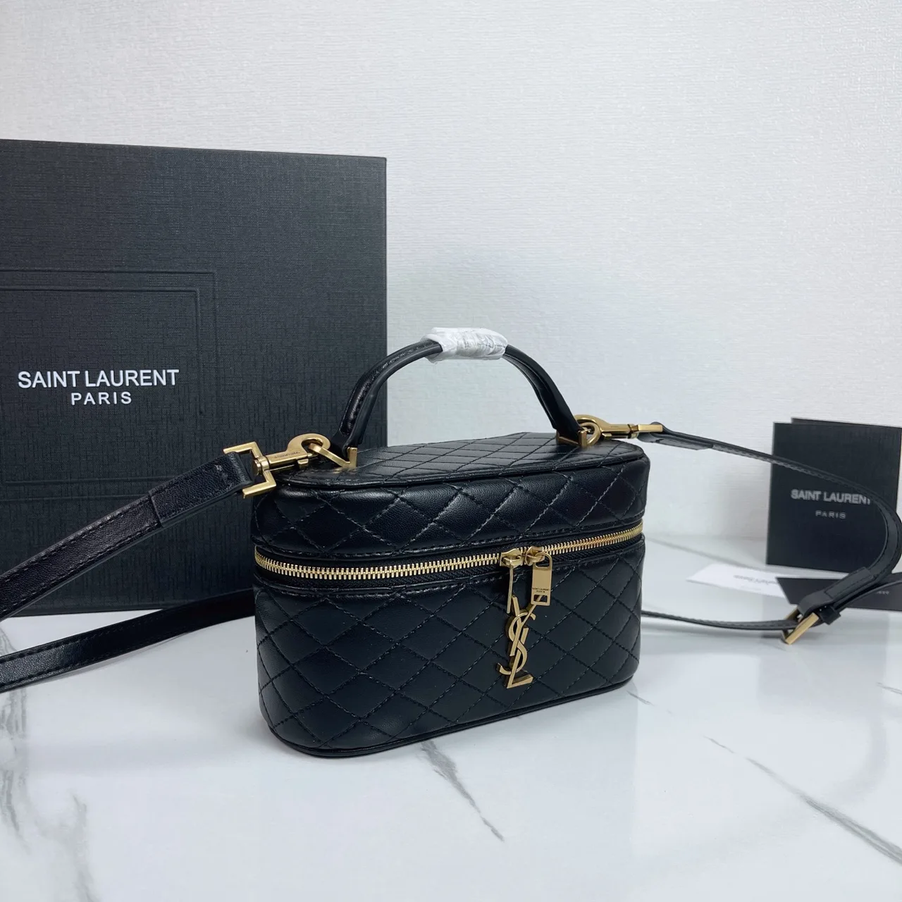 Saint Laurent Quilted Clutch in Black · view 2