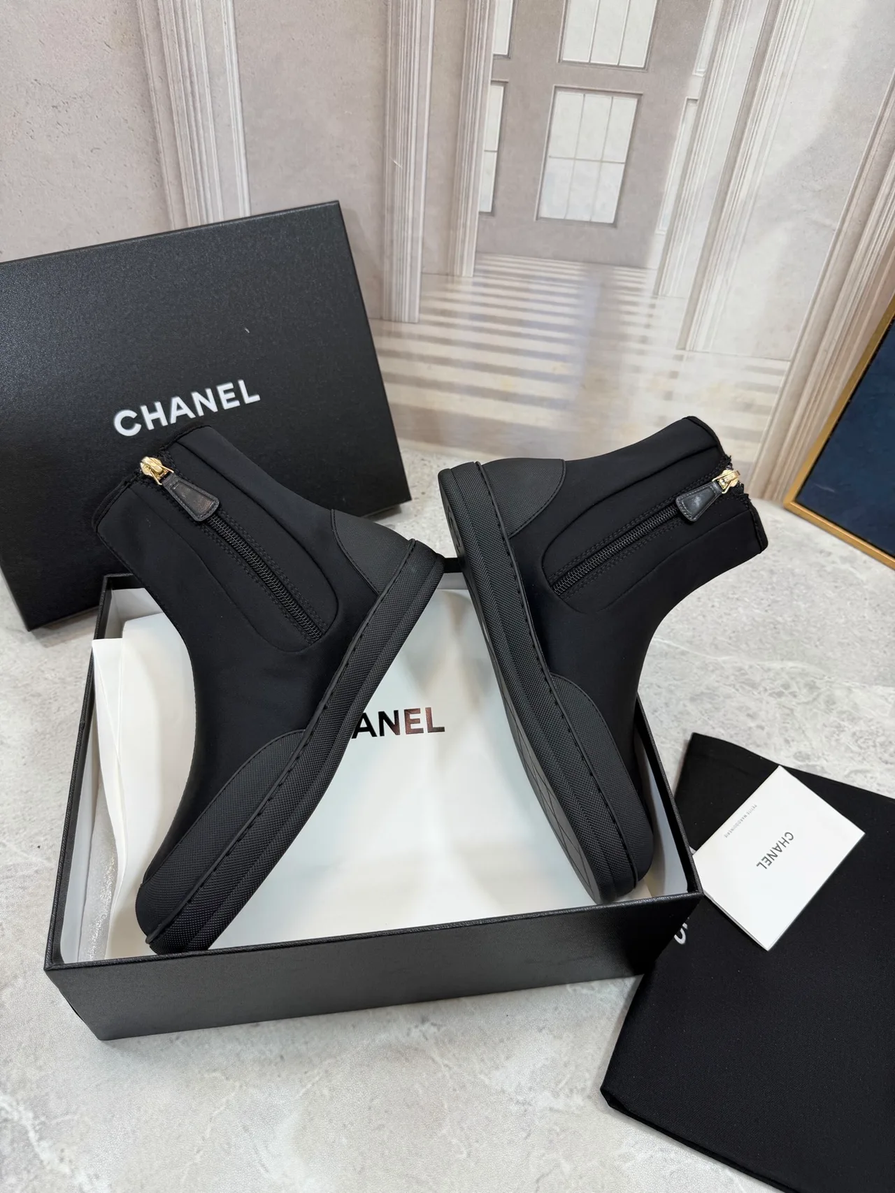 Chanel Cowhide Knit Ankle Boots in Black · view 1