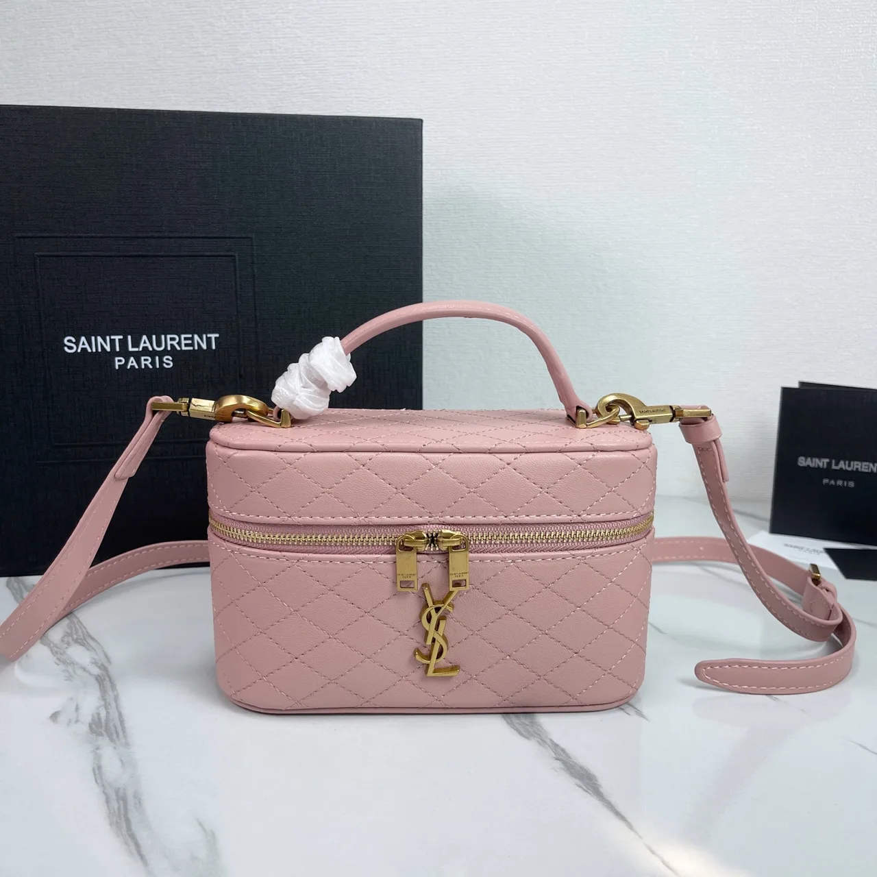 Saint Laurent Quilted Clutch in Pink · view 1