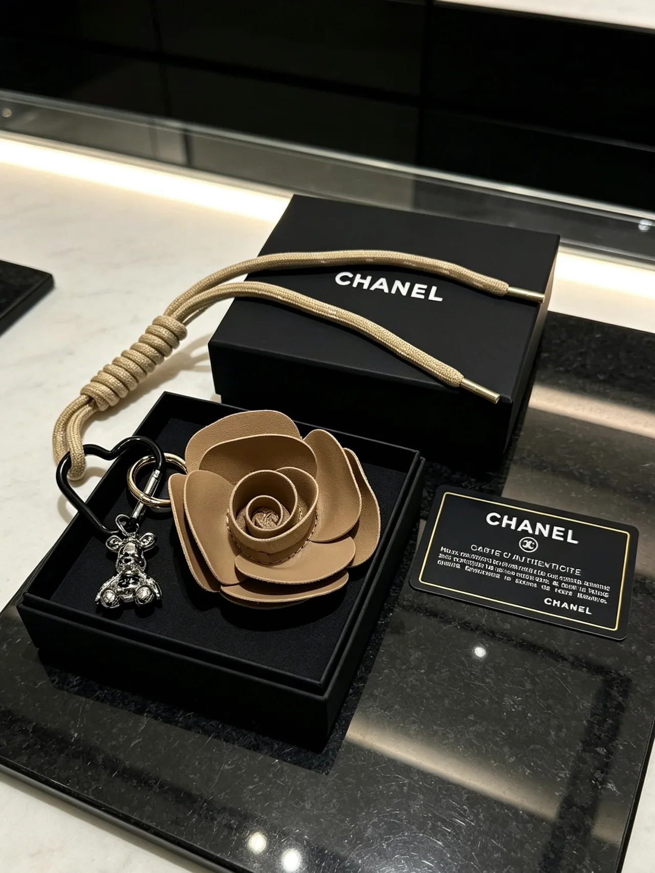 Chanel Woven Rose Keychain in Brown · view 6