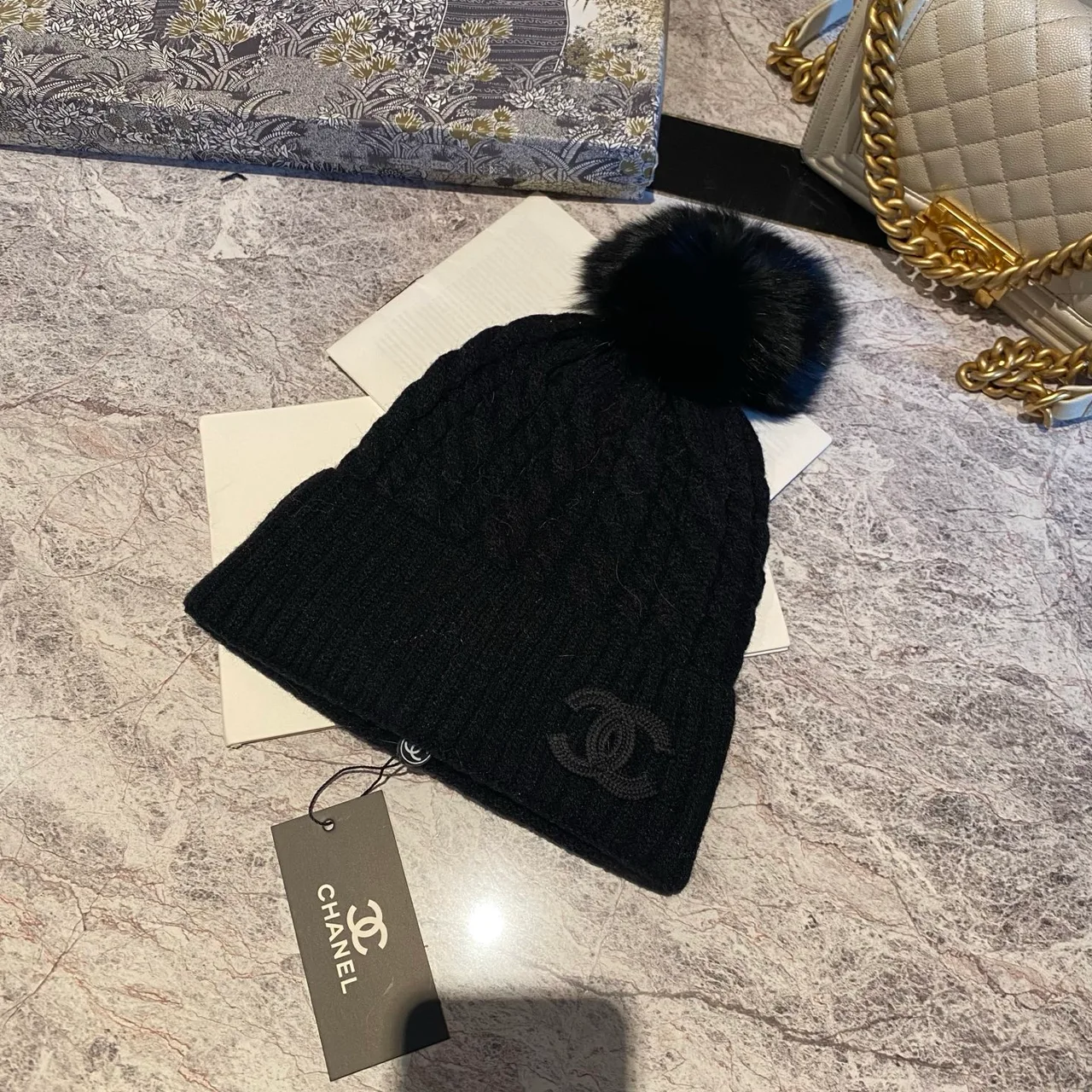 Chanel Pom-Pom Beanie in Black & White & Beige & Brown & Grey · view 1