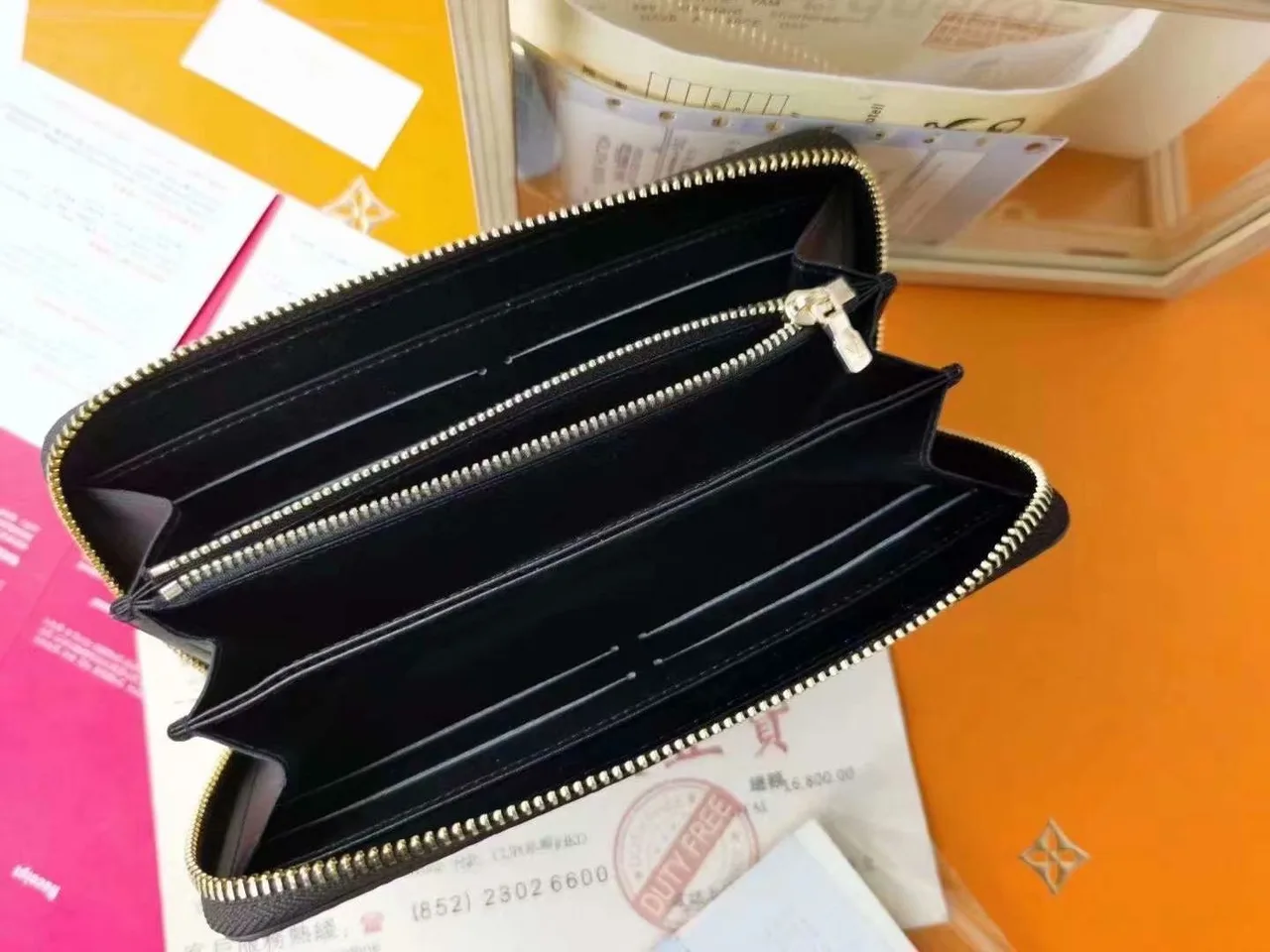 Louis Vuitton Giant Monogram Zip Wallet in Brown · view 7
