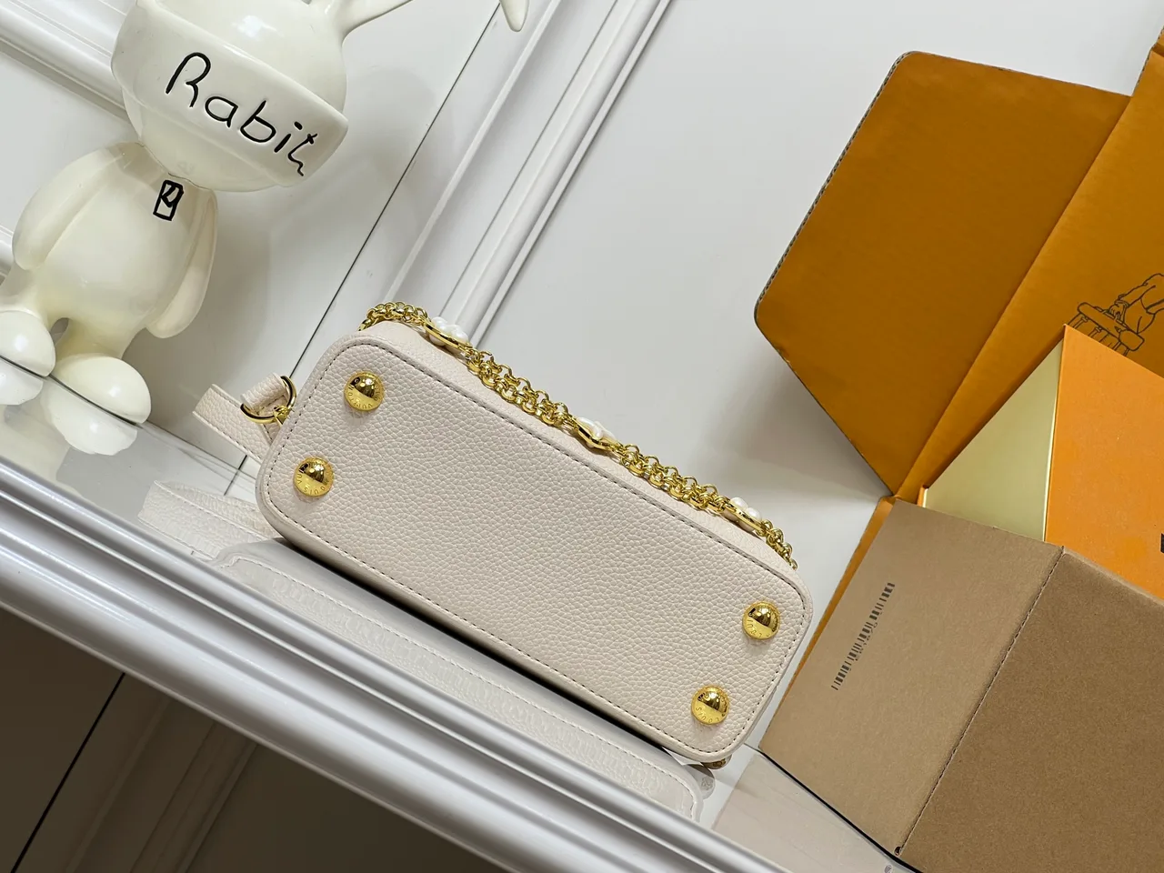 Louis Vuitton Cowhide Top-Handle Bag in White · view 7