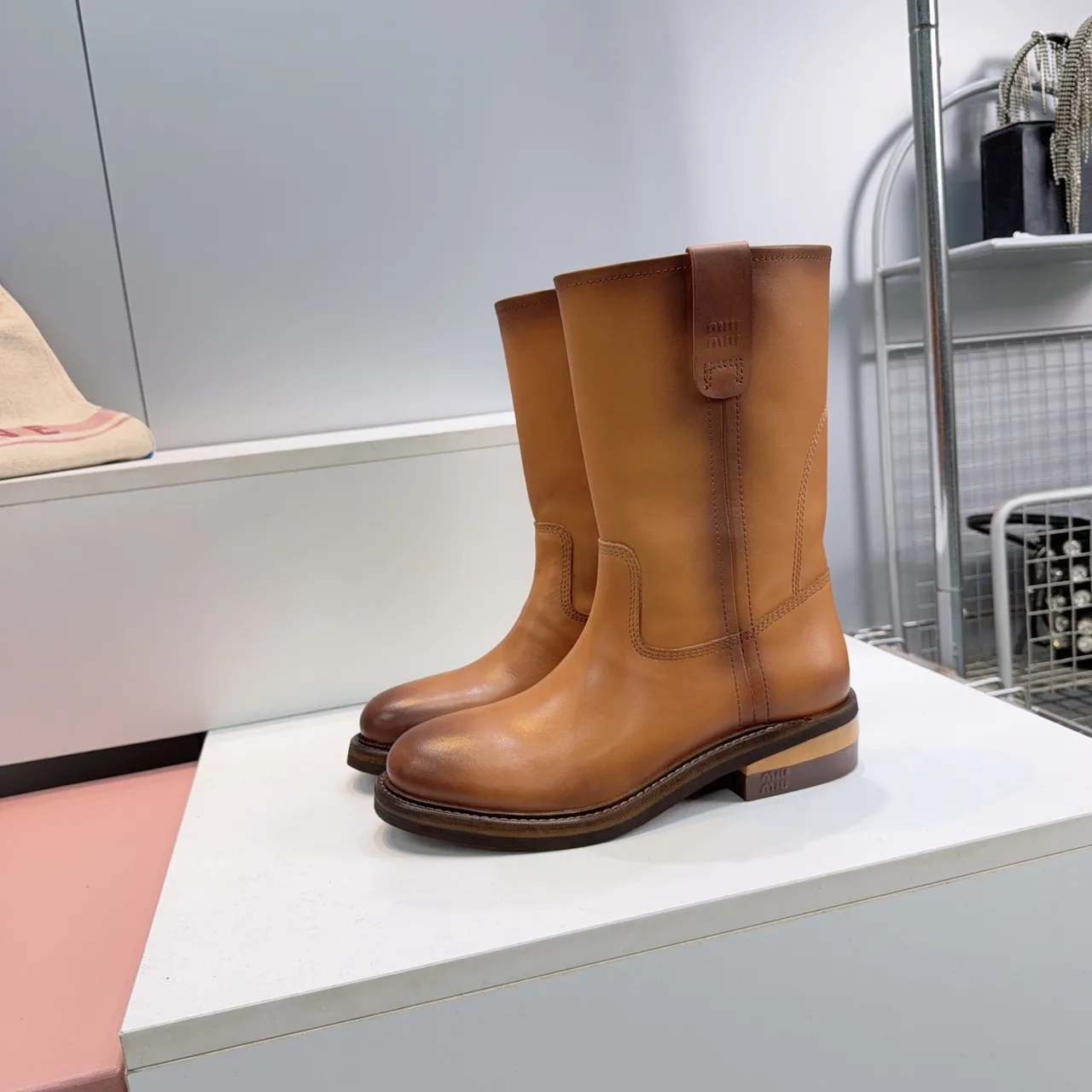Miu Miu Cowhide Smooth Round-Toe Mid-Calf Boots in Brown · view 1