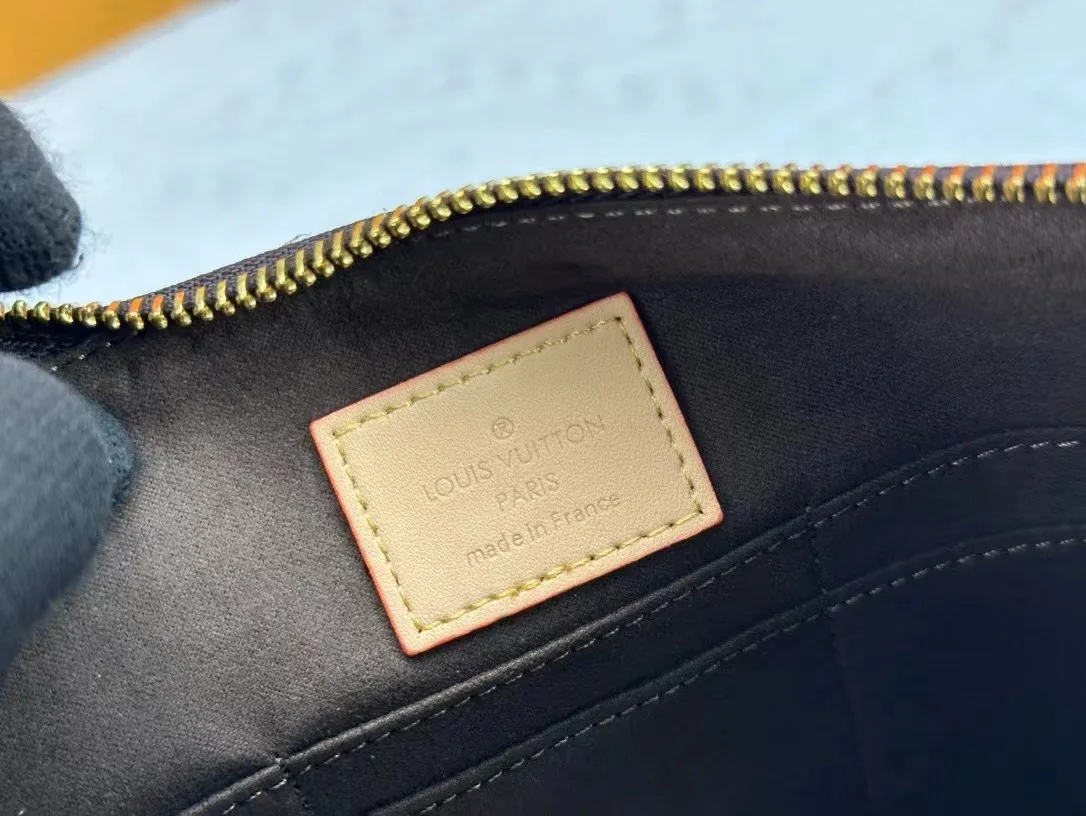 Louis Vuitton Calfskin Wristlet Pouch in Brown · view 9