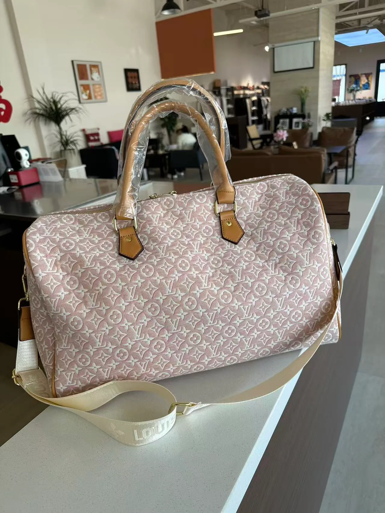Louis Vuitton Duffel Bag in Pink · view 1