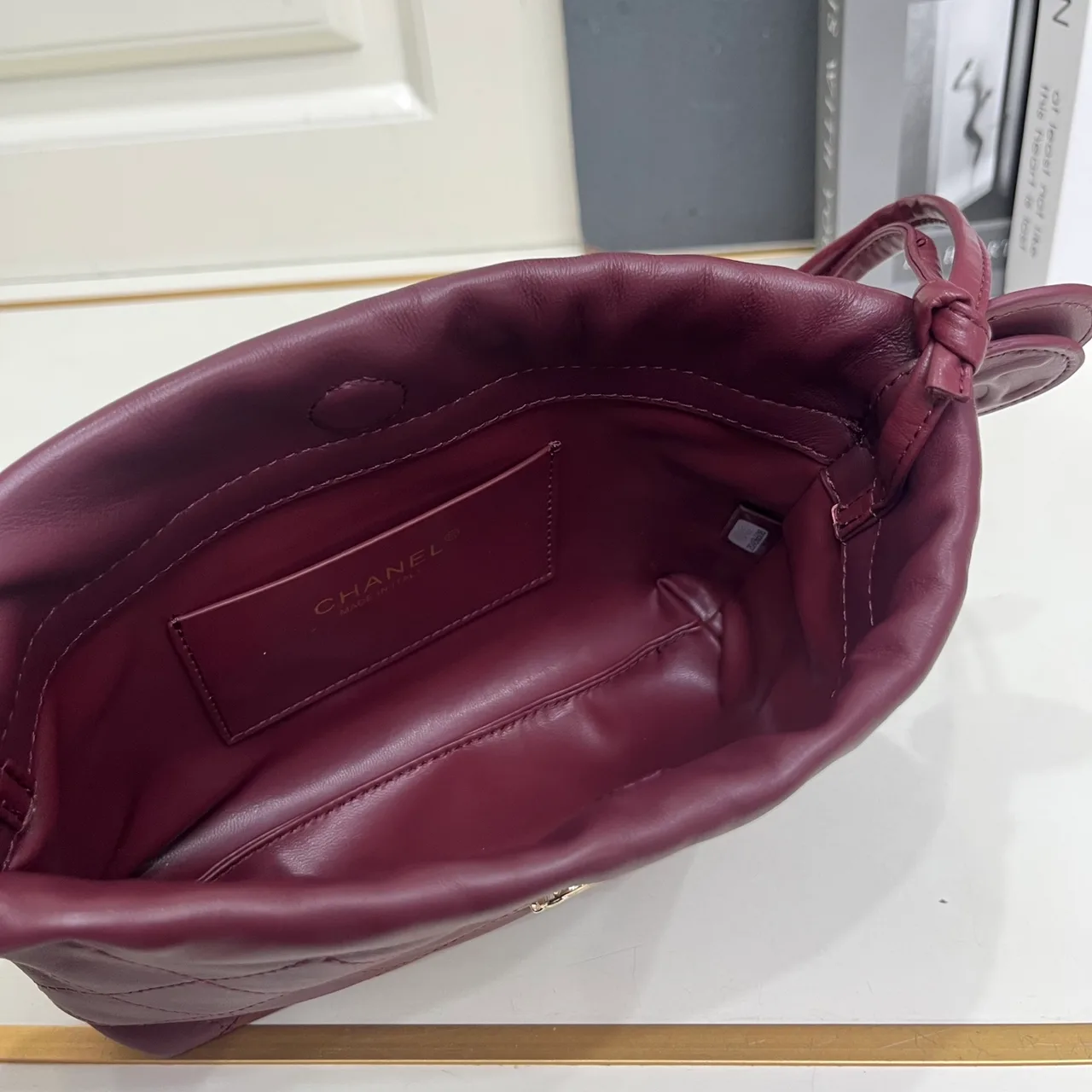 Chanel Quilted Crossbody Bag in Burgundy · view 8
