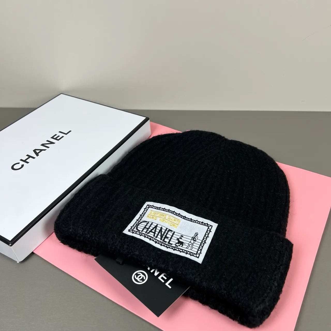 Chanel Label-patch knit beanie in Black & Cream · view 1