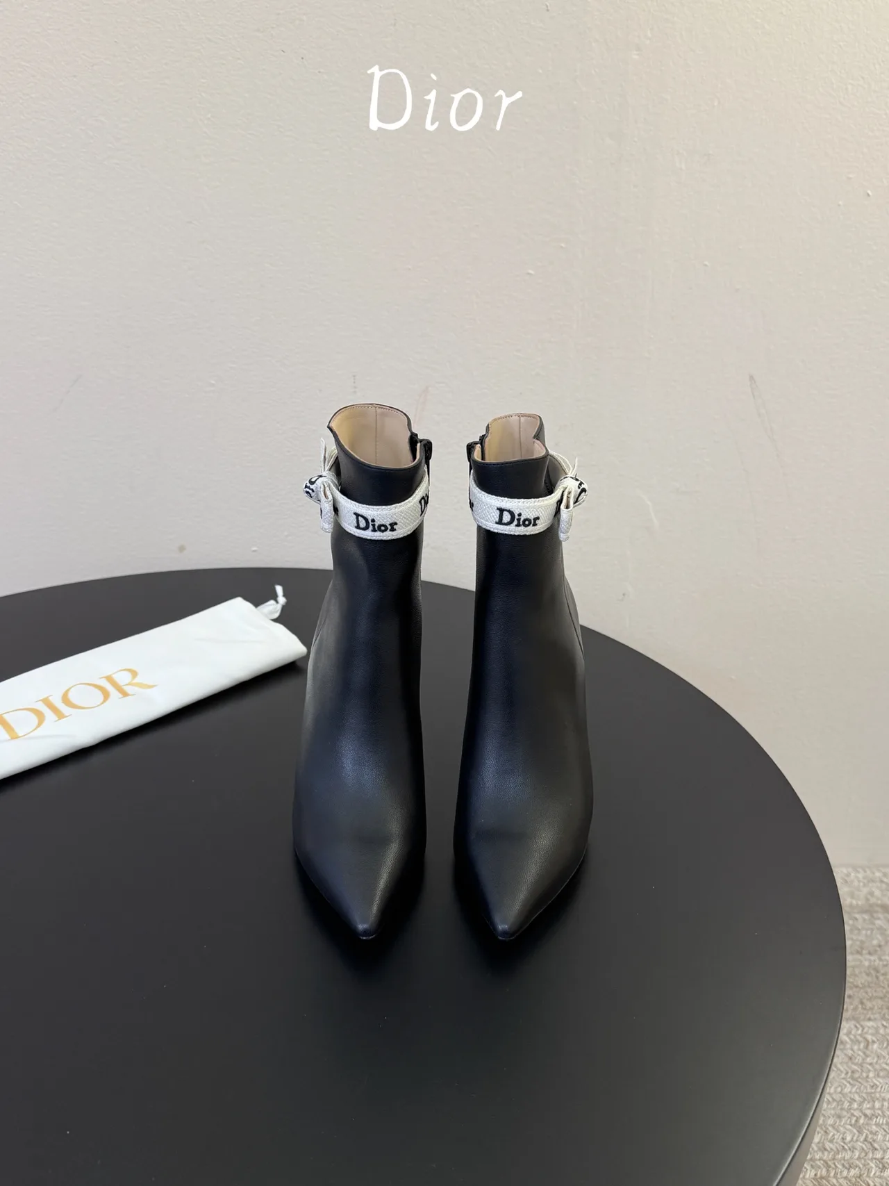 Dior Cowhide Glossy Pointed-Toe Ankle Boots in Black · view 1