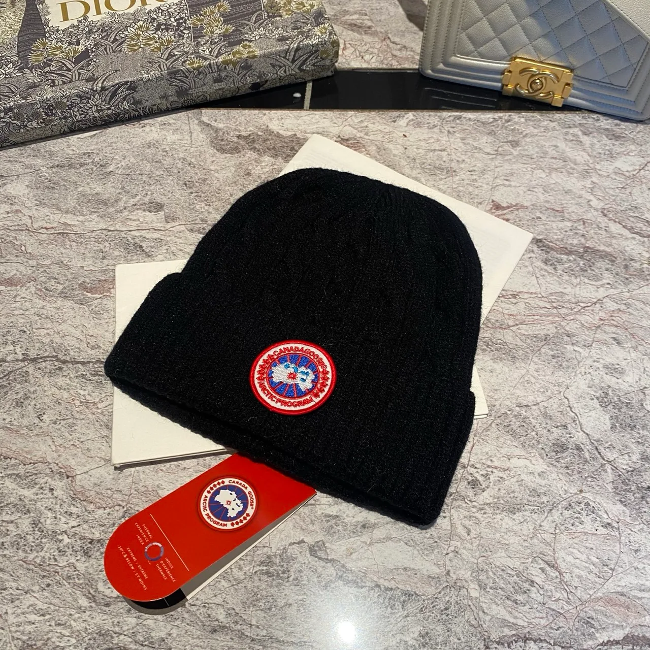 Canada Goose Cable knit beanie in Black & White & Grey & Brown & Blue & Burgundy & Cream & Pink · view 1