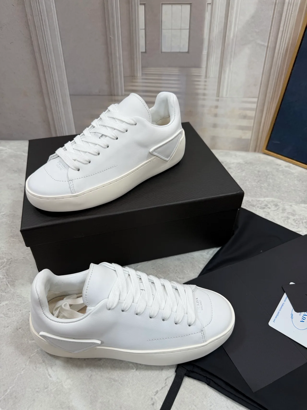 Prada Cowhide Smooth Low-Top Sneakers in White · view 2