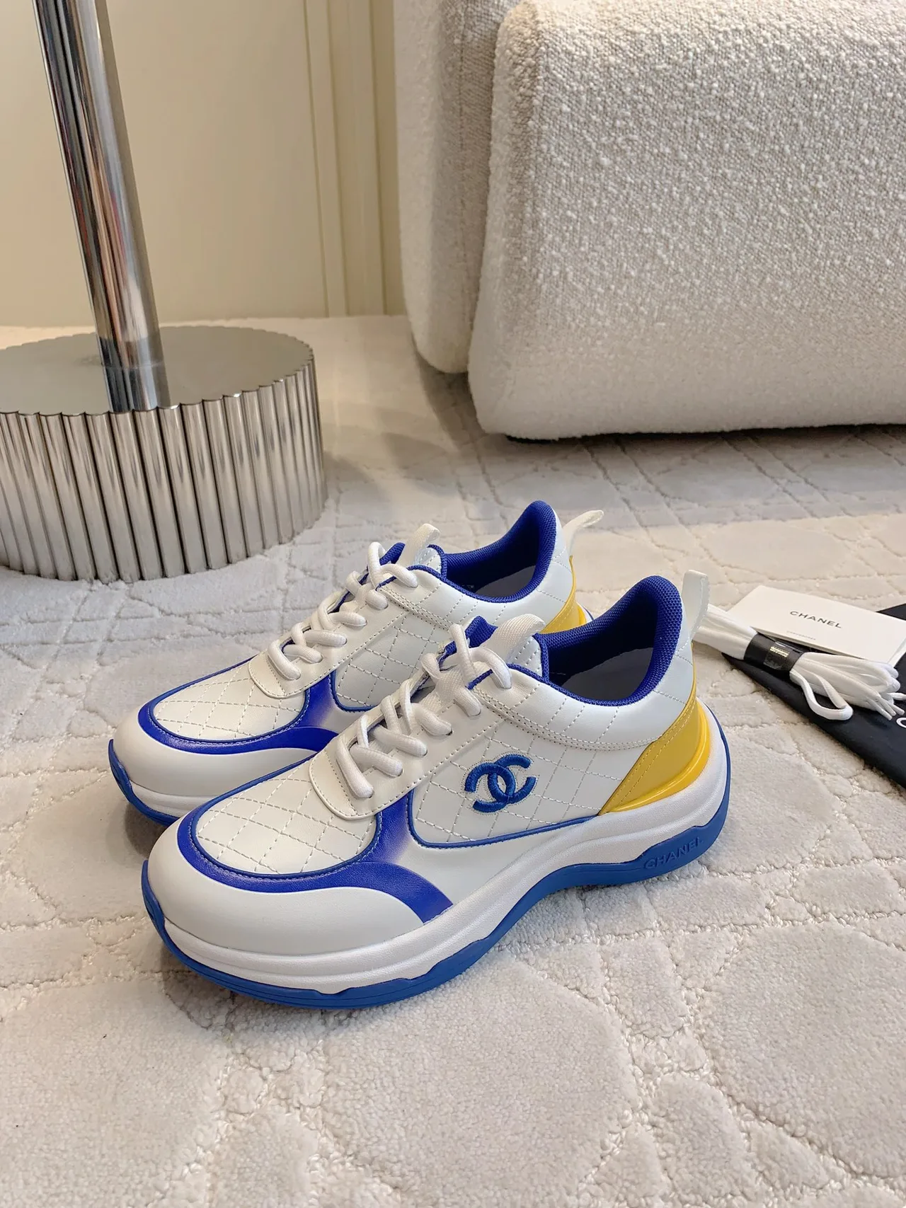 Chanel Quilted Sneakers in White · view 2
