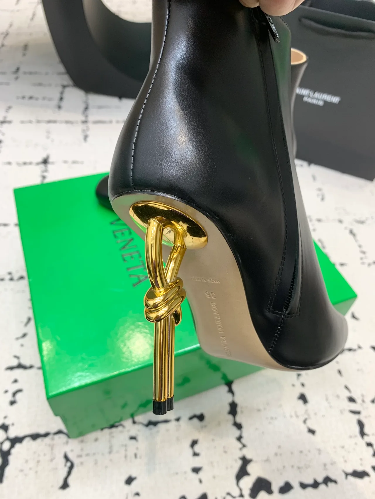 Calfskin Smooth Pointed-Toe Knot-Heel Ankle Boots in Black · view 8
