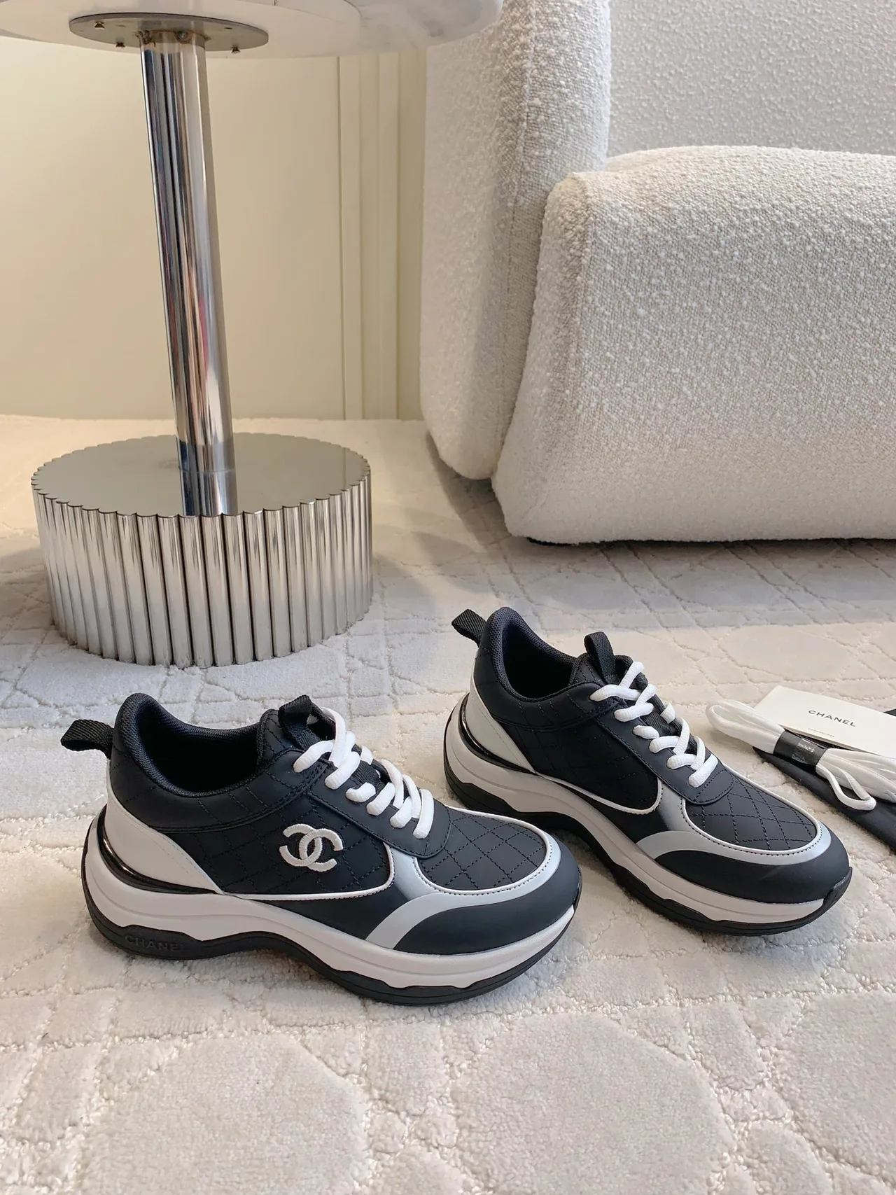 Chanel Quilted Sneakers in Black · view 3