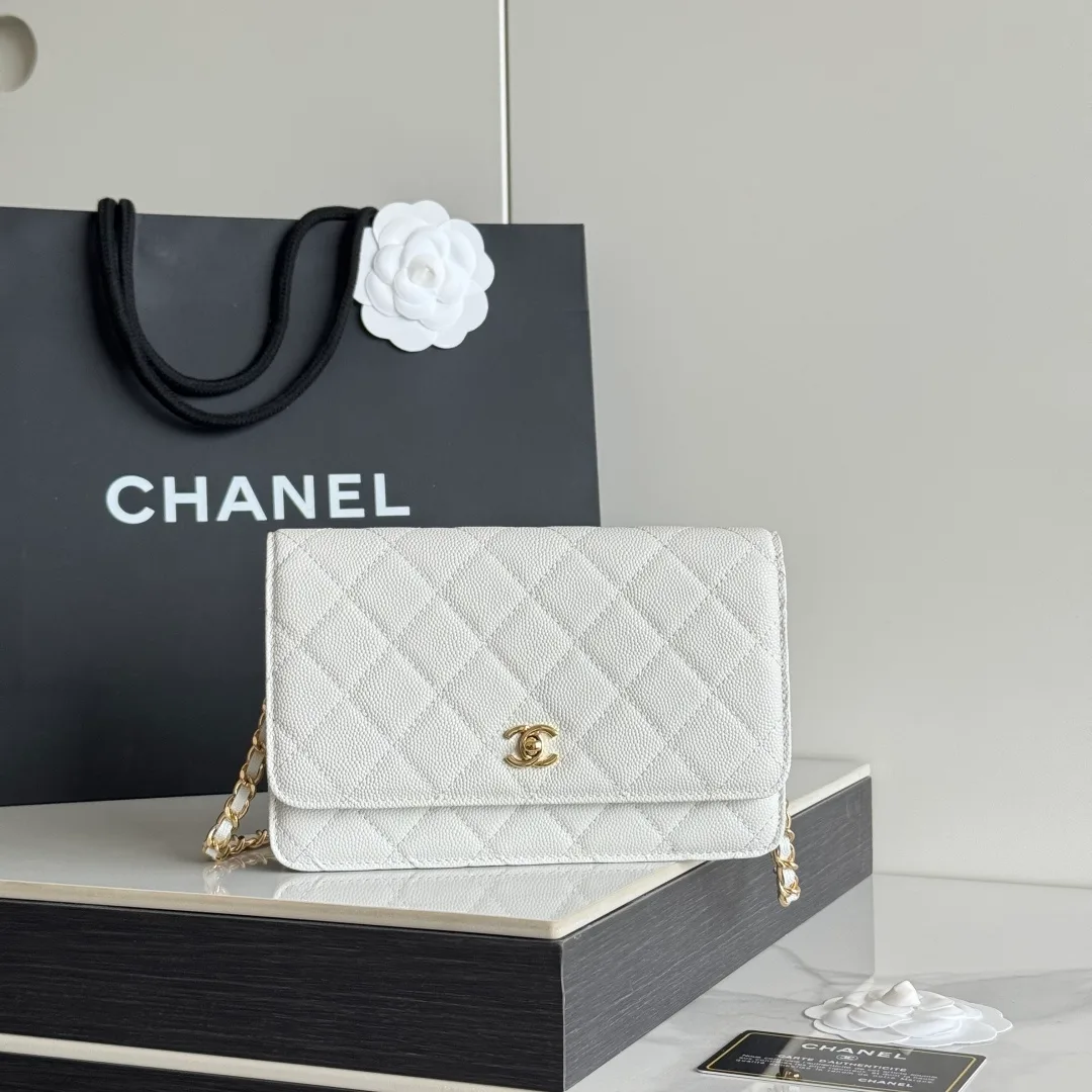 Chanel Calfskin Quilted Clutch in White · view 1
