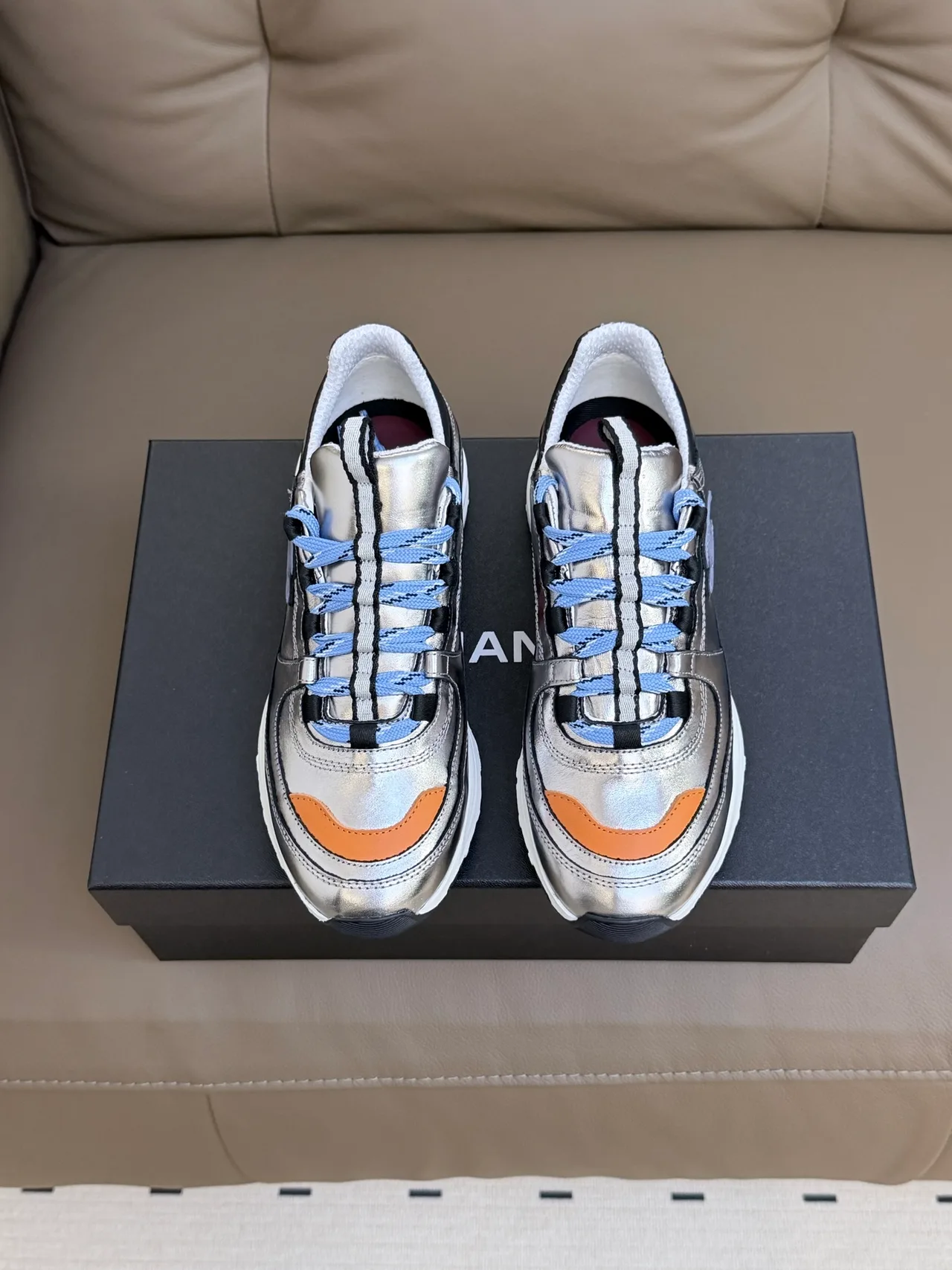 Chanel Cowhide Sheepskin Lace-Up Sneakers in Silver · view 1