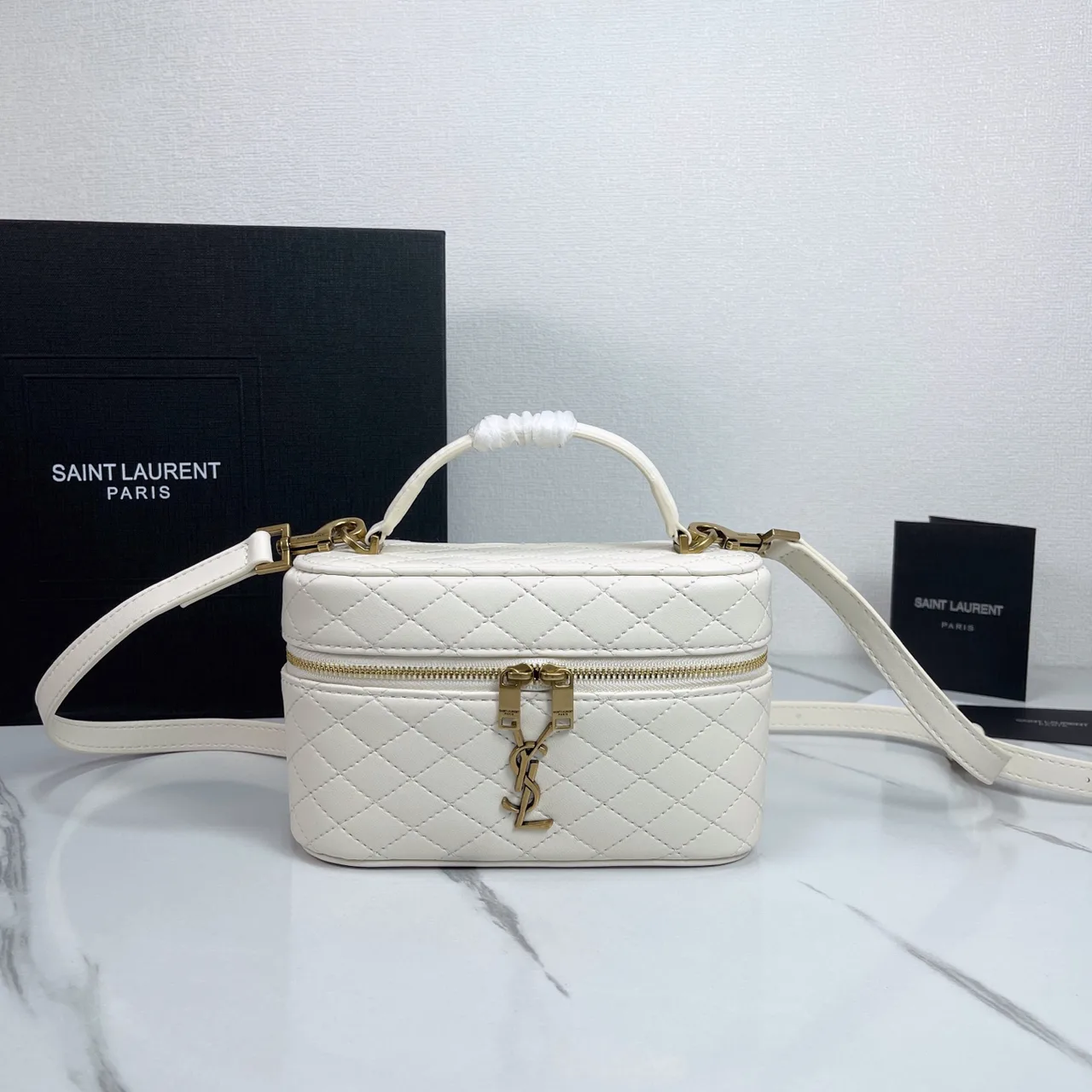 Saint Laurent Quilted Crossbody Bag in White · view 1