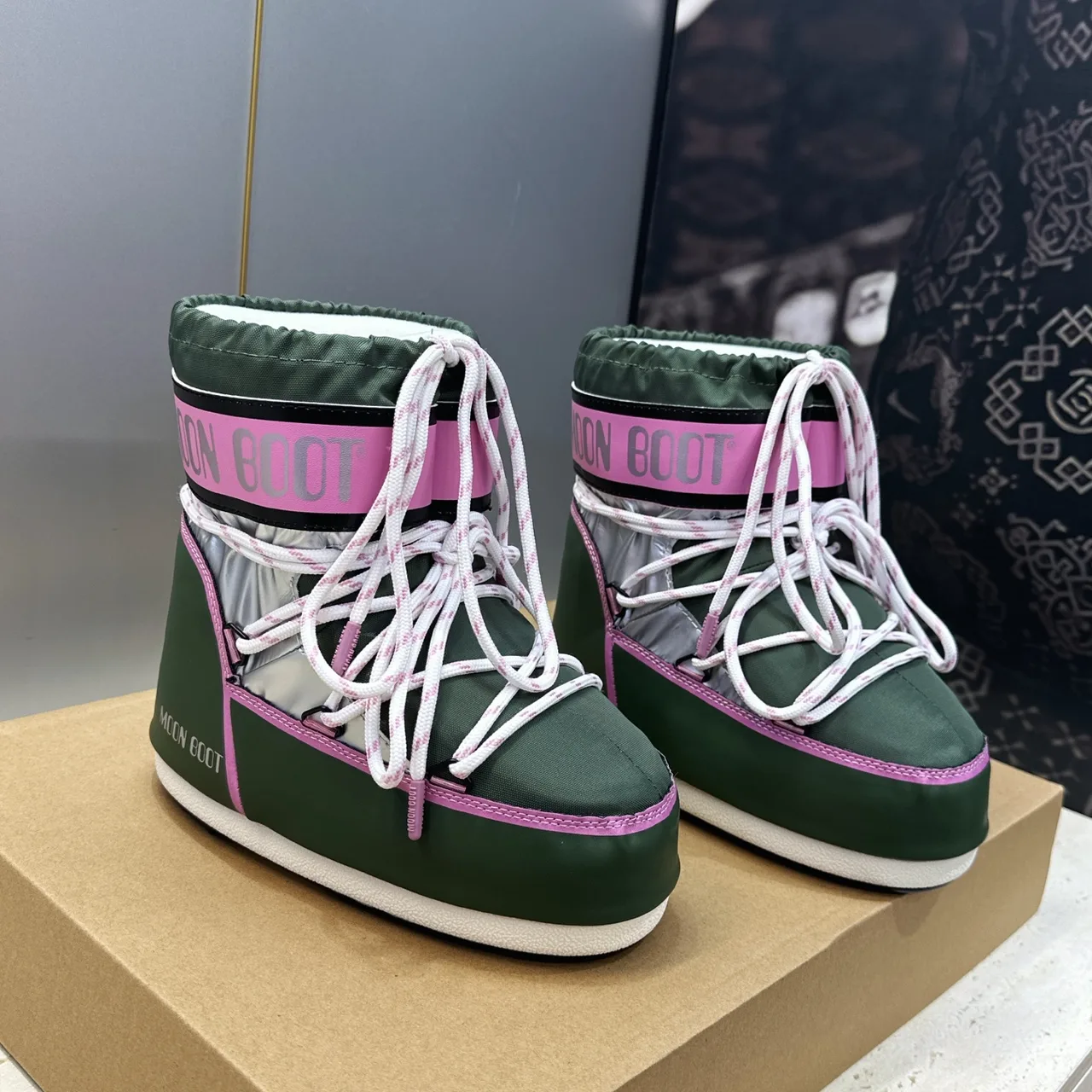 Moon Boot Quilted Striped Lace-Up Snow Boots in Green · view 1