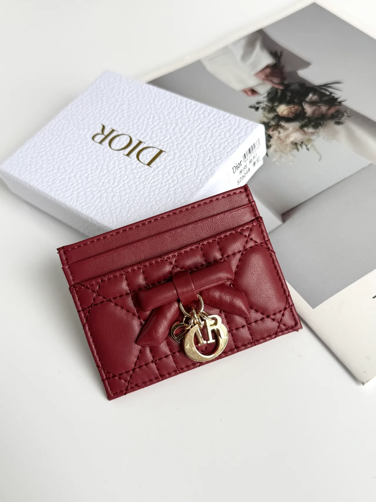 Dior Lambskin Quilted Bow Cardholder in Burgundy · view 1