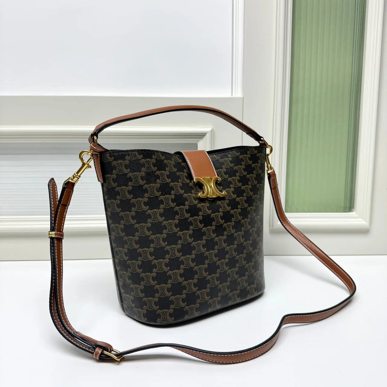 Celine Calfskin Quilted Monogram Bucket Bag in Brown · view 2