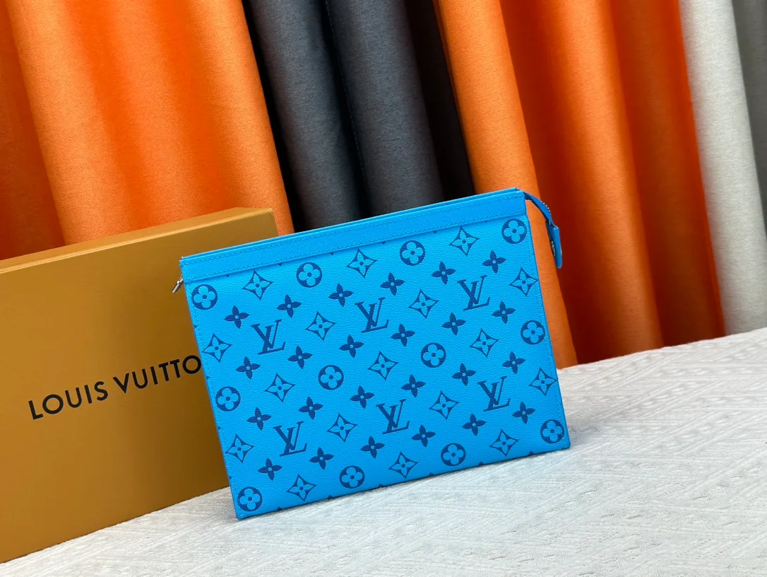 Louis Vuitton Canvas Clutch in Blue · view 1