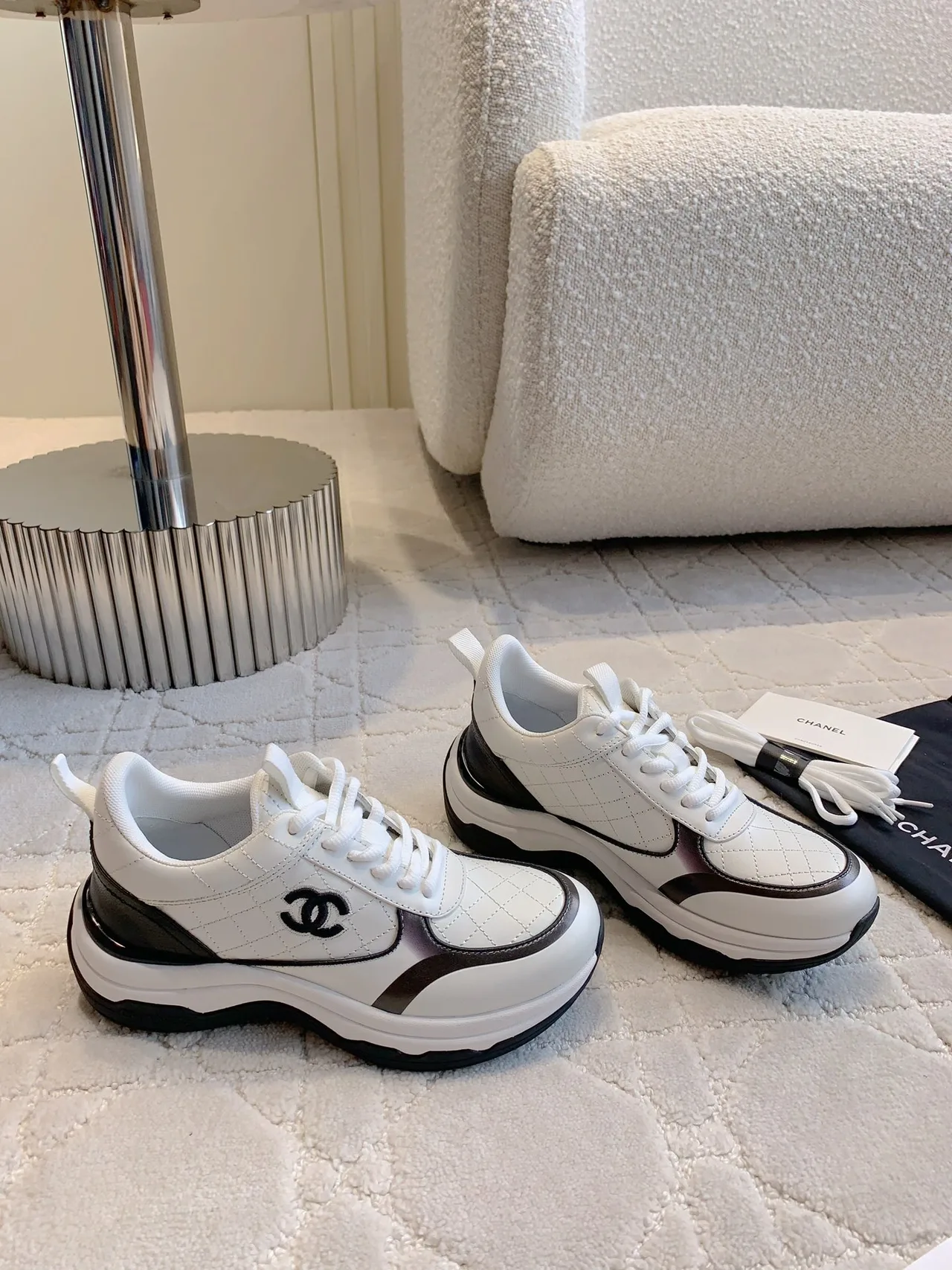 Chanel Quilted Sneakers in White · view 3
